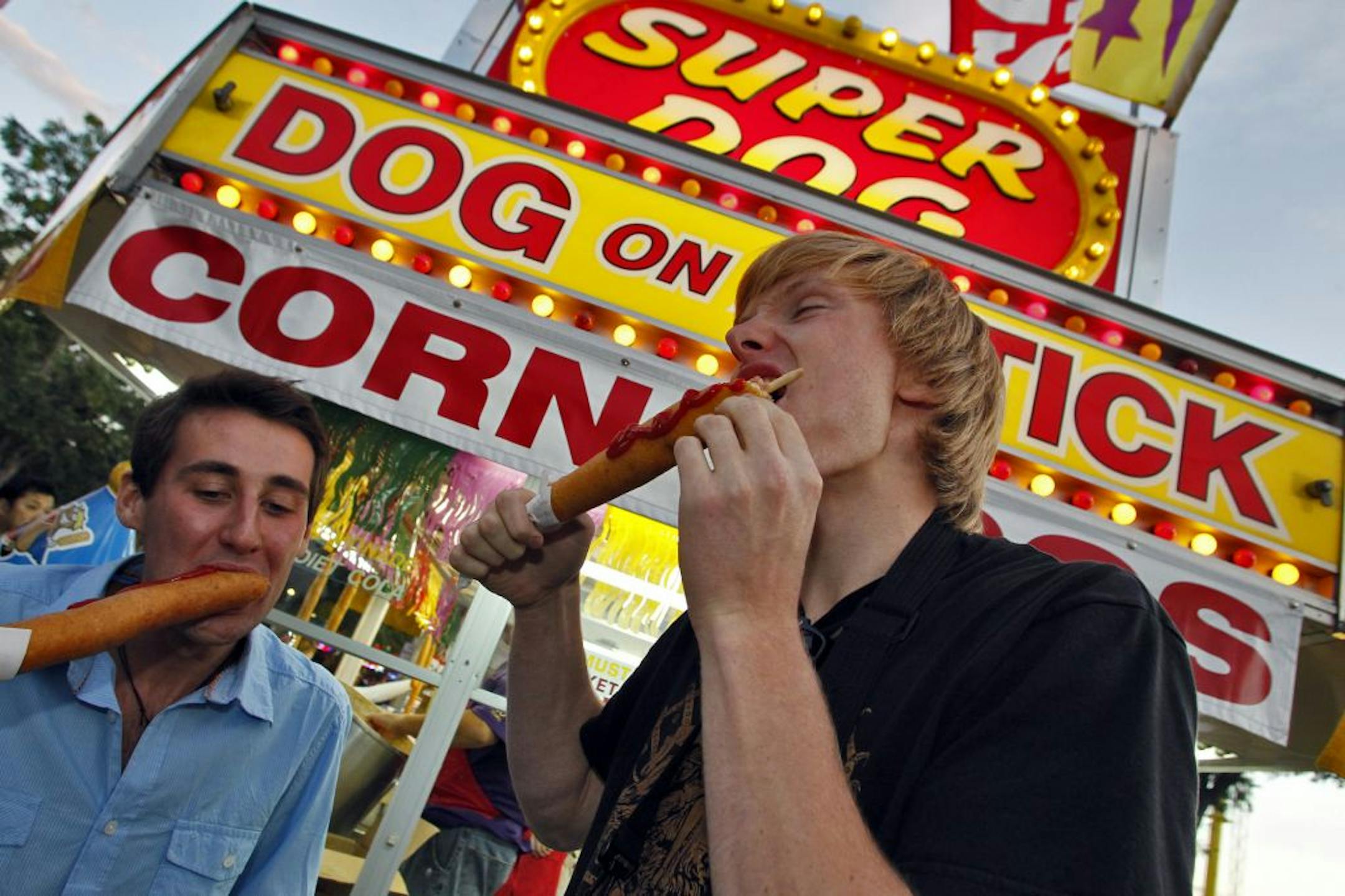 Macalester College in St. Paul some of its international students for a first-time look at the Minnesota State Fair as part of their orientation program. Wojciech Michno of Sweden, Simon Sanggaard of Denmark, Emma Cederlund of Norway, Agnes Navun Biswalo of Tanzania, Tsz Kin Hui of Hong Kong and Pukitta Chunsuttiwat of Tailand visited the fair together. Wojciech Michno, left and Simon Sanggaard tasted their first corn dogs.