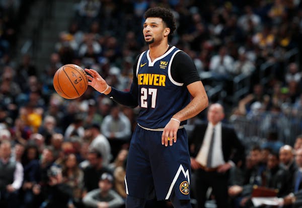 Denver Nuggets guard Jamal Murray (27) in the second half of an NBA basketball game Wednesday, Dec. 18, 2019, in Denver. The Nuggets won 113-104. (AP 