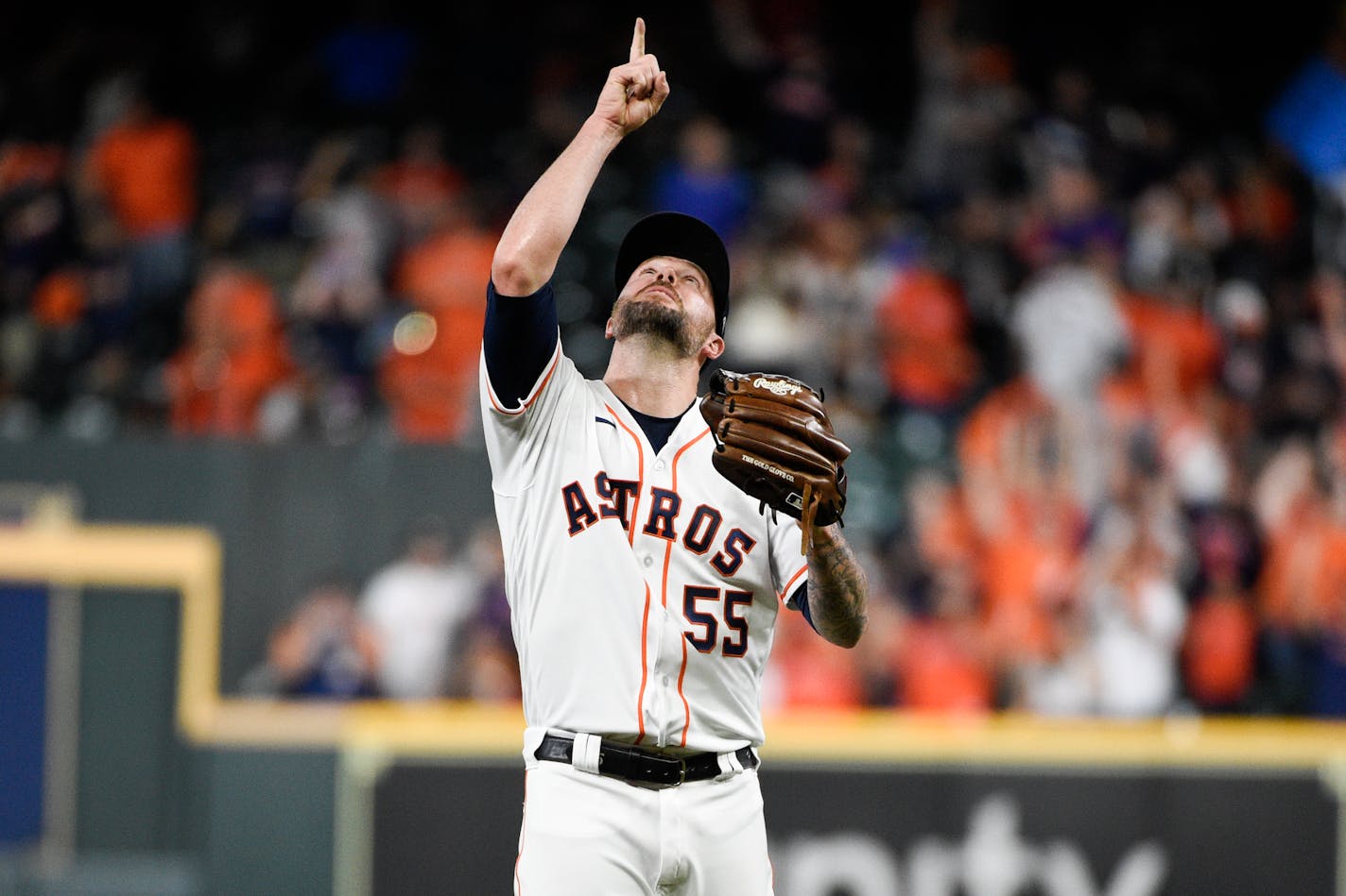 Houston Astros relief pitcher Ryan Pressly reacts after the final out in the ninth inning in Game 1 of a baseball American League Division Series against the Chicago White Sox Thursday, Oct. 7, 2021, in Houston. The Astros won 6-1. (AP Photo/Eric Christian Smith)