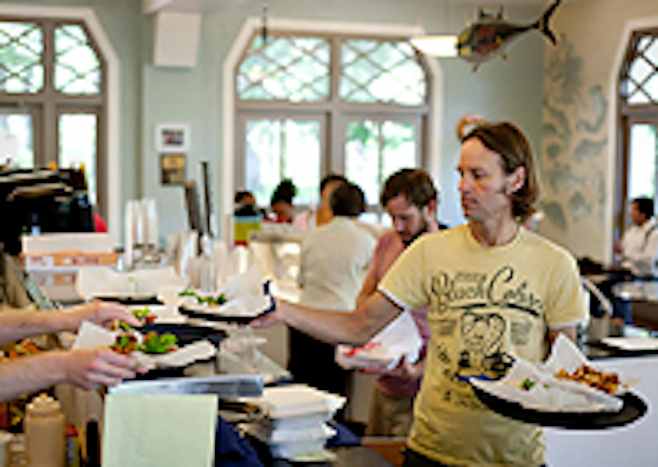 Sea Salt Eatery co-owner Chris Weglinski, right delivered food orders.