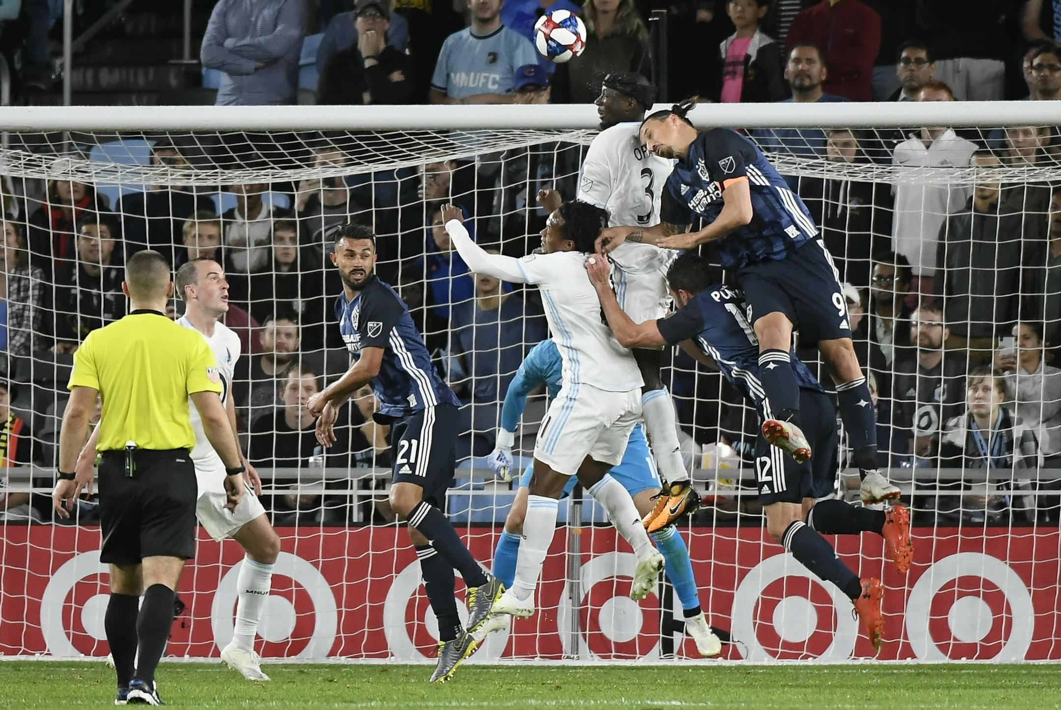 Los Angeles Galaxy forward Zlatan Ibrahimovic (9) and forward Chris Pontius (12) jumped for a header against Minnesota United forward Romario Ibarra (11) and defender Ike Opara (3) during a Galaxy corner kick late in the second half Wednesday. ] Aaron Lavinsky ¥ aaron.lavinsky@startribune.com Minnesota United FC played the Los Angeles Galaxy in an MLS soccer game on Wednesday, April 24, 2019 at Allianz Field in St. Paul, Minn.