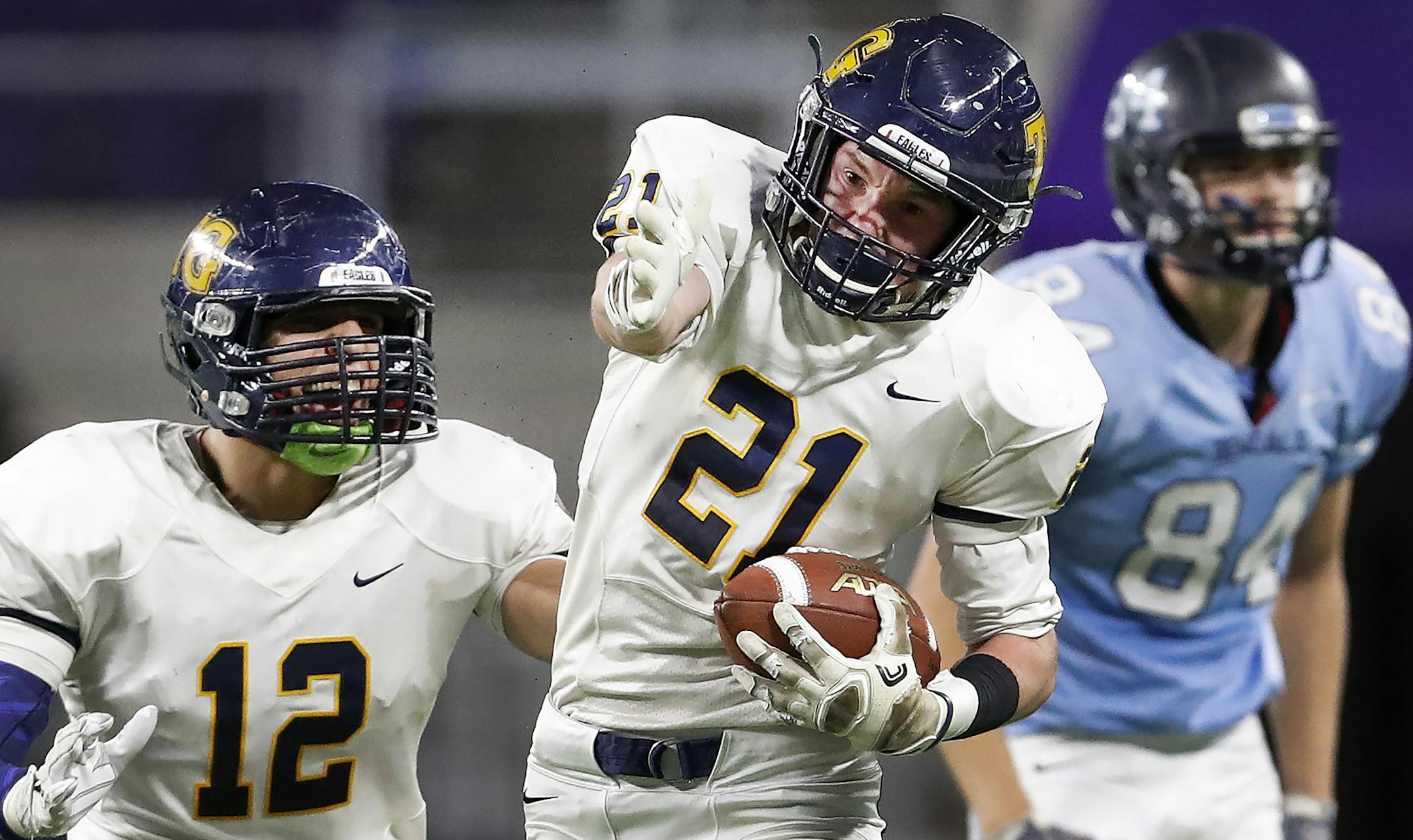 Nolan Neilson (21) celebrated after intercepting a pass in the fourth quarter. ] CARLOS GONZALEZ cgonzalez@startribune.com - November 17, 2016, Minneapolis, MN, US Bank Stadium, Prep Bowl / High School Football Class 6A semifinals Blaine vs. Totino-Grace