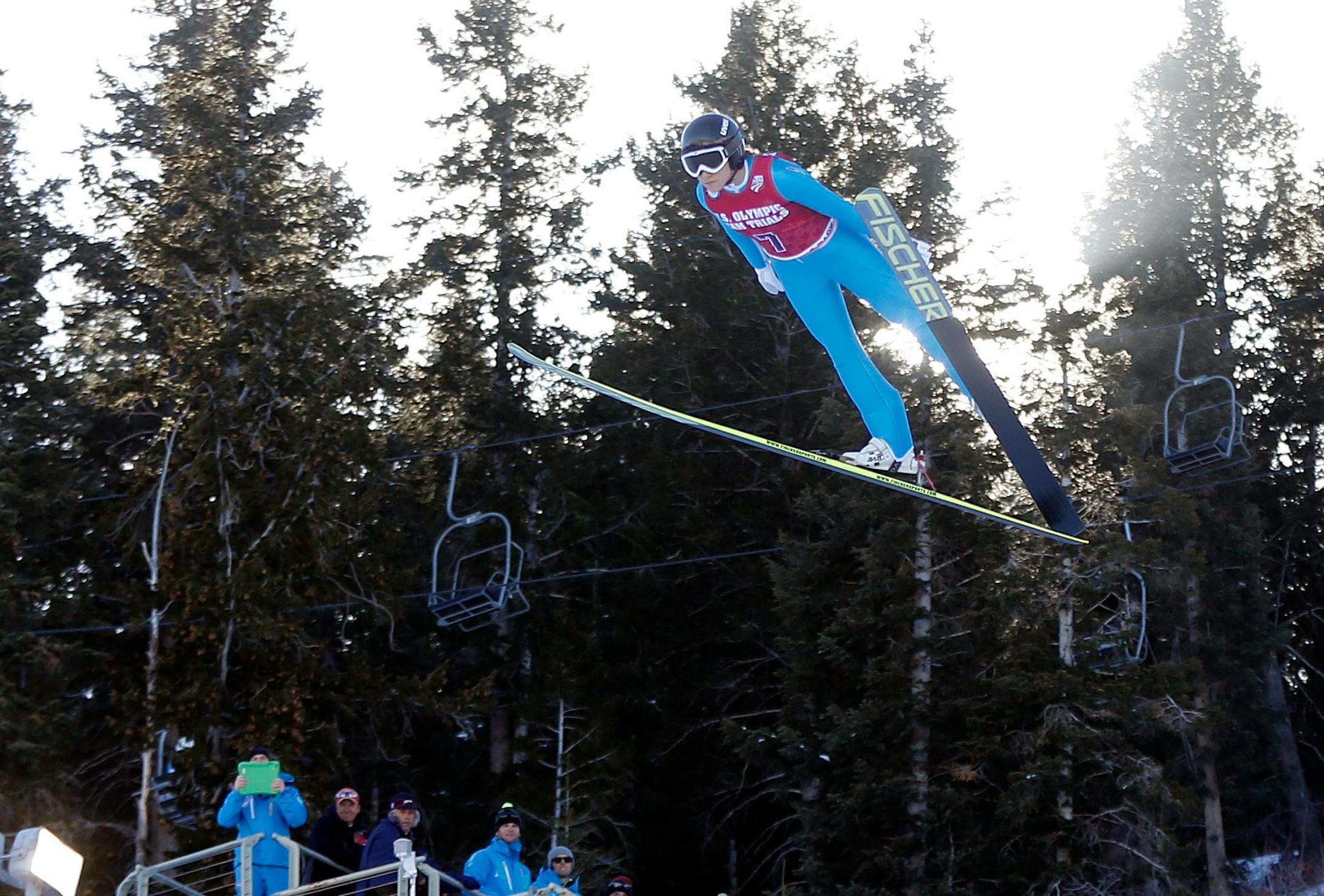First-place finisher Jessica Jerome competes in the women's ski jumping event at the U.S. Olympic trials in Park City, Utah, Sunday, Dec. 29, 2013. (AP Photo/Jim Urquhart)