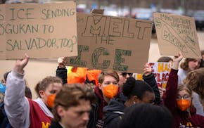 University of Minnesota students and other supporters protested outside the courthouse during a hearing for University of Minnesota graduate student D
