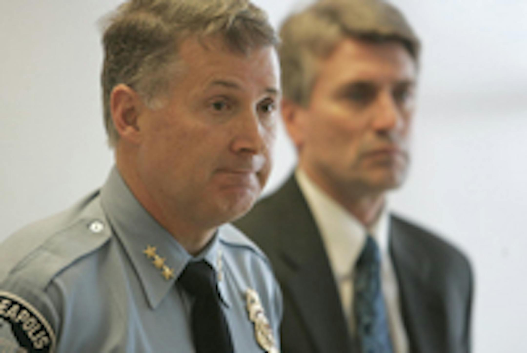 Minneapolis Police Chief Timothy Dolan, left, and Mayor R.T. Rybak