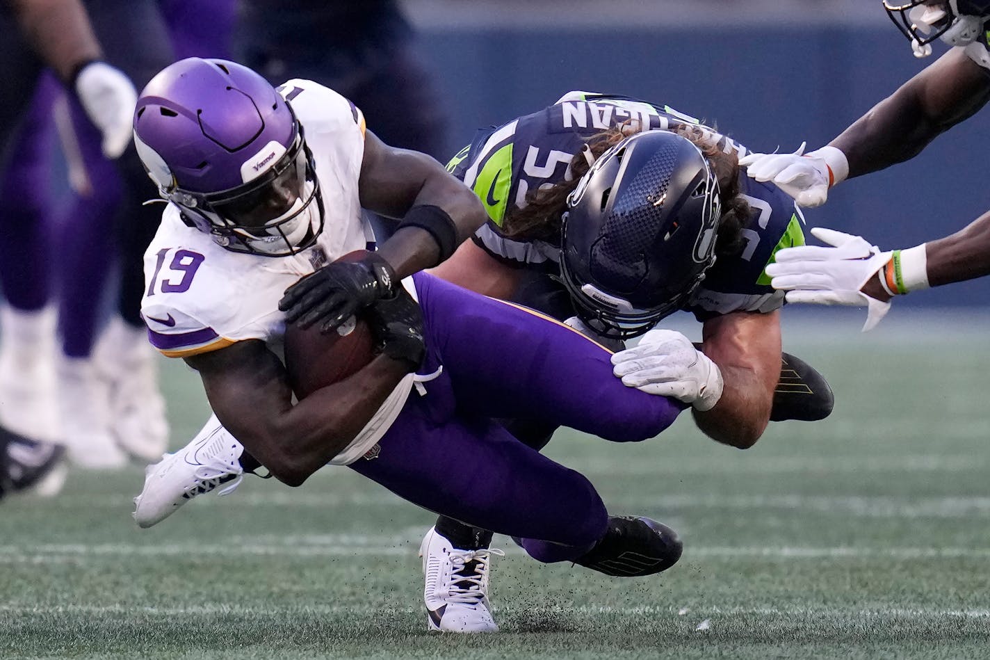 Minnesota Vikings wide receiver Brandon Powell (19) is tackled by Seattle Seahawks linebacker Jon Rhattigan during the first half of an NFL preseason football game in Seattle, Thursday, Aug. 10, 2023. (AP Photo/Gregory Bull)