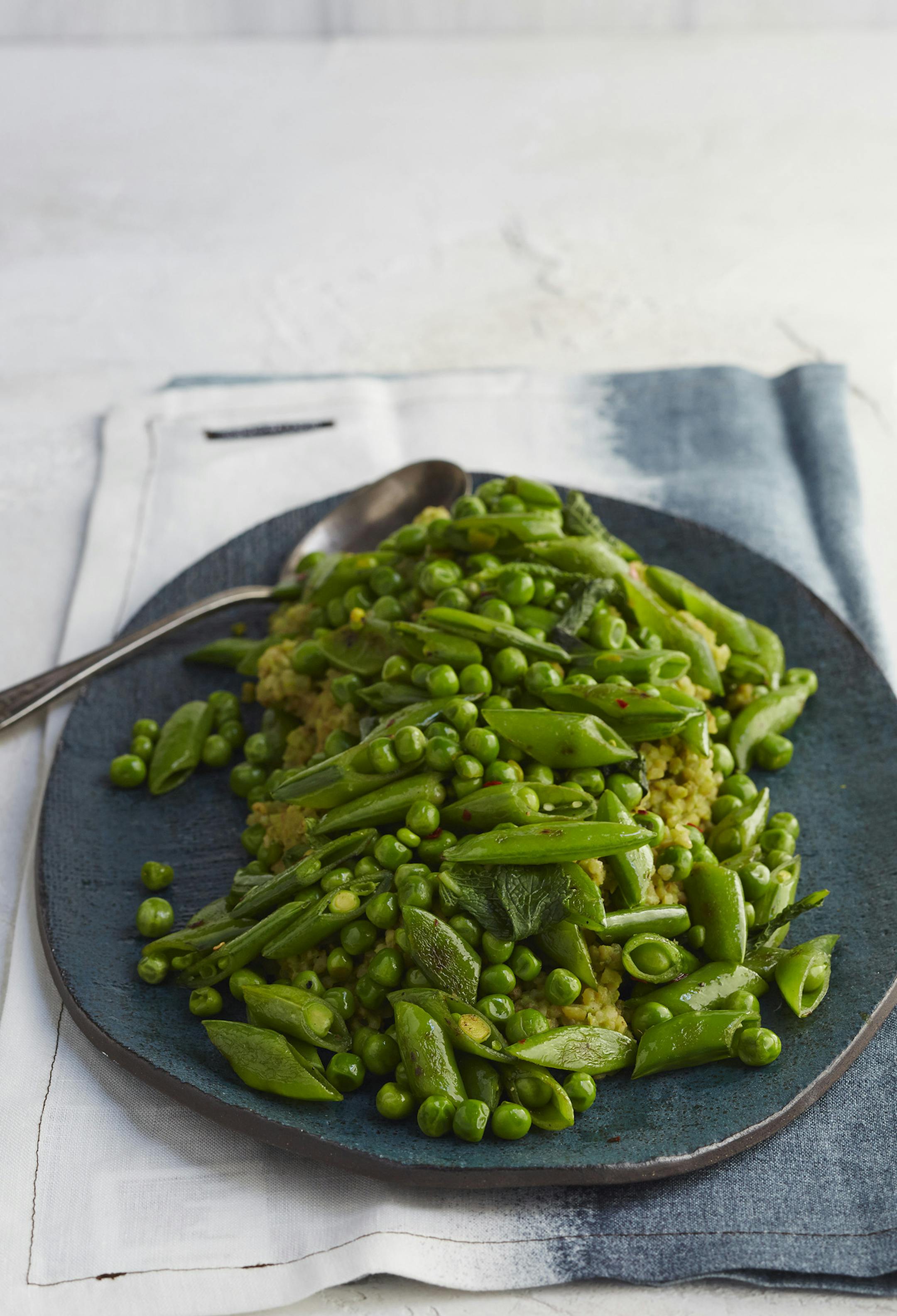 Cracked Wheat Pilaf With Spring Peas. "Excerpted from Floyd Cardoz: Flavorwalla by Floyd Cardoz (Artisan Books). Copyright ©2016. Photographs by Lauren Volo.î