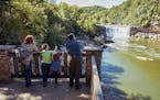 Visitors gather on the observation deck at Cumberland Falls State Resort Park in southeastern Kentucky. (parks.ky.gov/TNS)