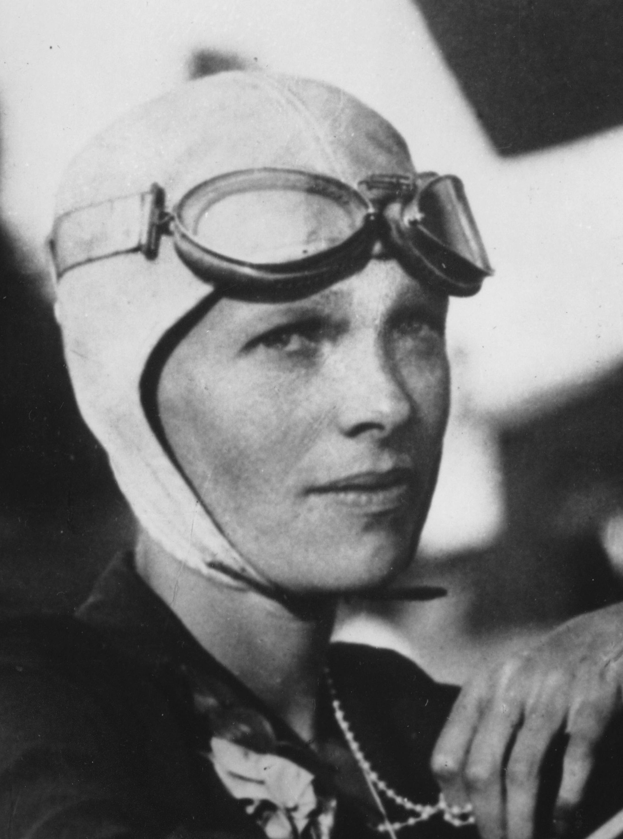 FILE-- An undated file photo shows Amelia Earhart, the first woman to fly solo across the Atlantic Ocean. Secretary of State Hillary Rodham Clinton is meeting Tuesday March 20, 2012, with historians and scientists from The International Group for Historic Aircraft Recovery, which will launch a new search in June for the wreckage of Earhart's plane off the remote island of Nikumaroro. (AP Photo) ORG XMIT: MIN2014040821081604