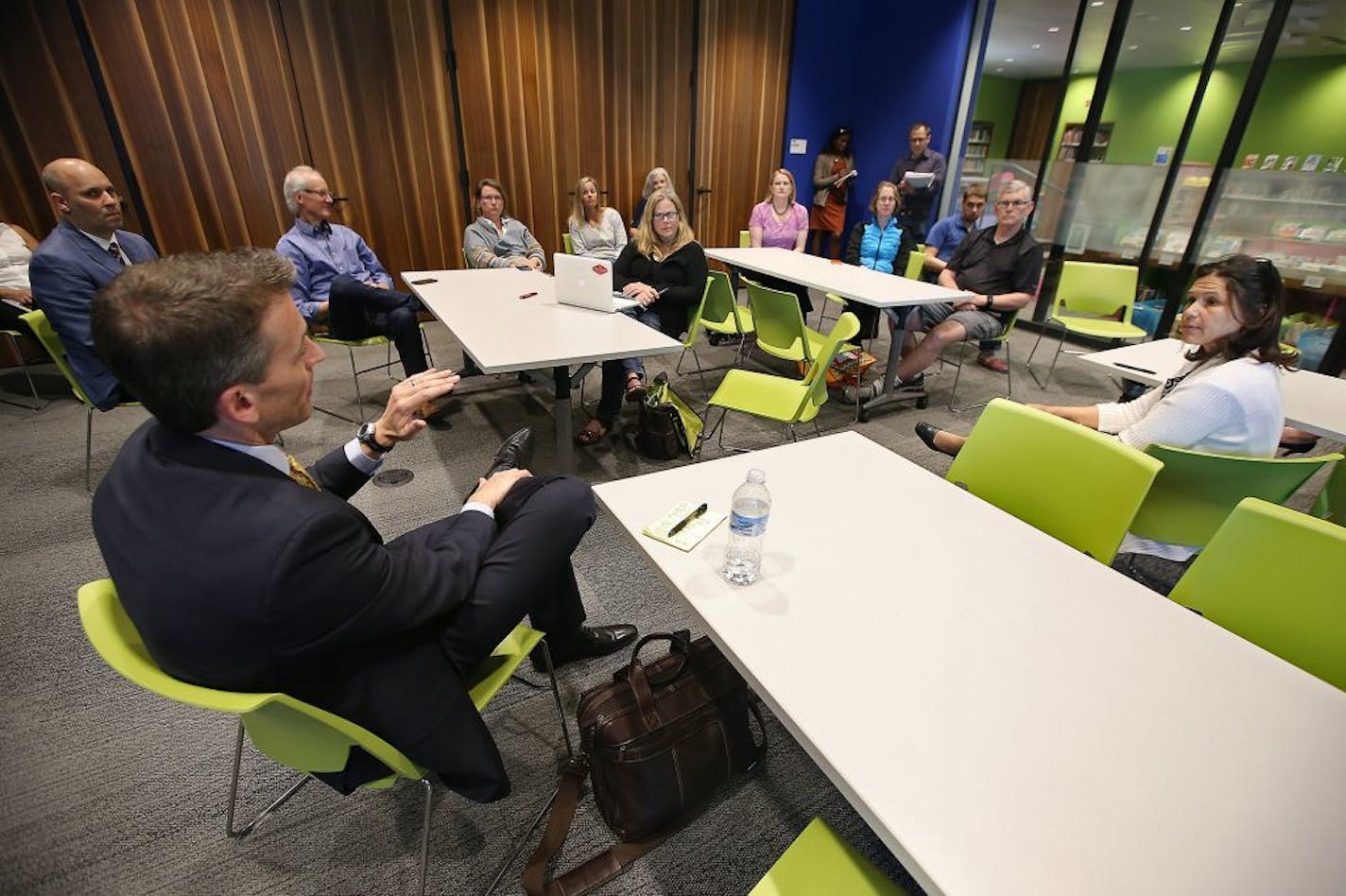 Ed Graff, the outgoing superintendent of Anchorage schools, left, and Minnesota Education Commissioner Brenda Cassellius, right, joined for a meet and greet with the community at the Walker Hennepin County Library, Monday, May 16, 2016 in Minneapolis, MN.