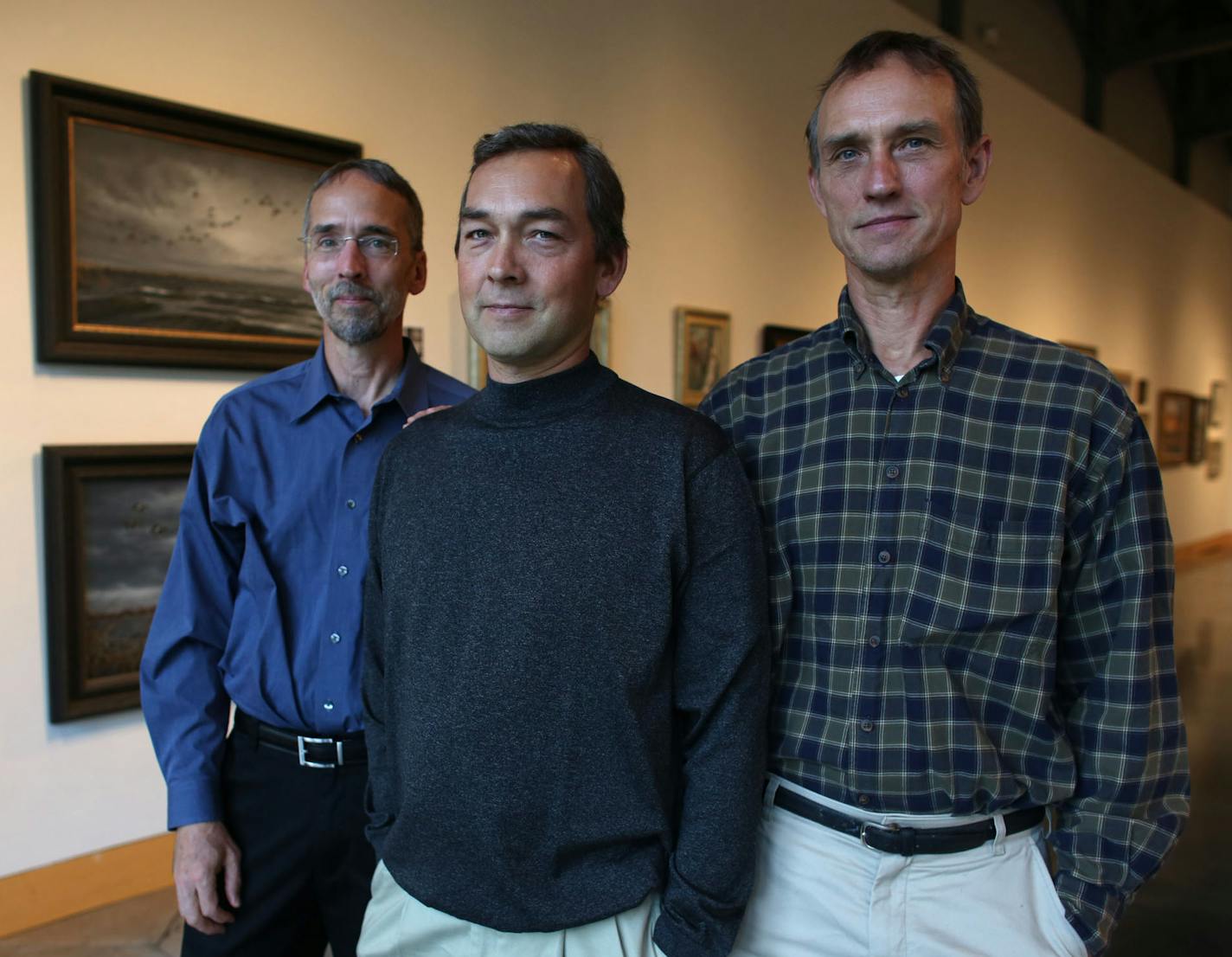 From left, brothers Joe, Jim and Robert Hautman stood in the gallery of their work at the Minnetonka Center for Arts in Minnetonka Min., Wednesday, October 1, 2013 ] (KYNDELL HARKNESS/STAR TRIBUNE) kyndell.harkness@startribune.com