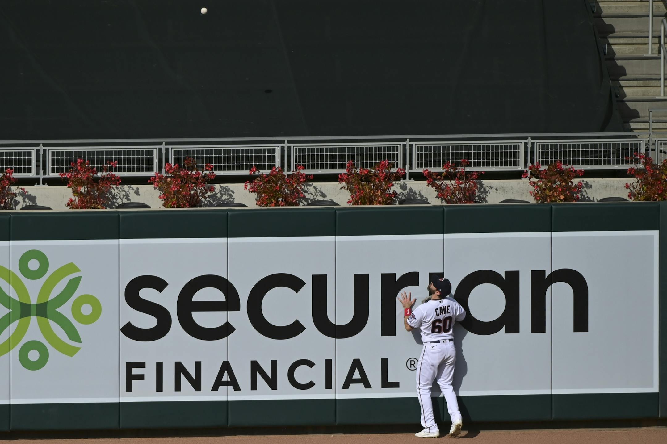 Kansas City Royals second baseman Whit Merrifield (15) hit a home run over Minnesota Twins right fielder Jake Cave (60) in the top of the fourth inning.