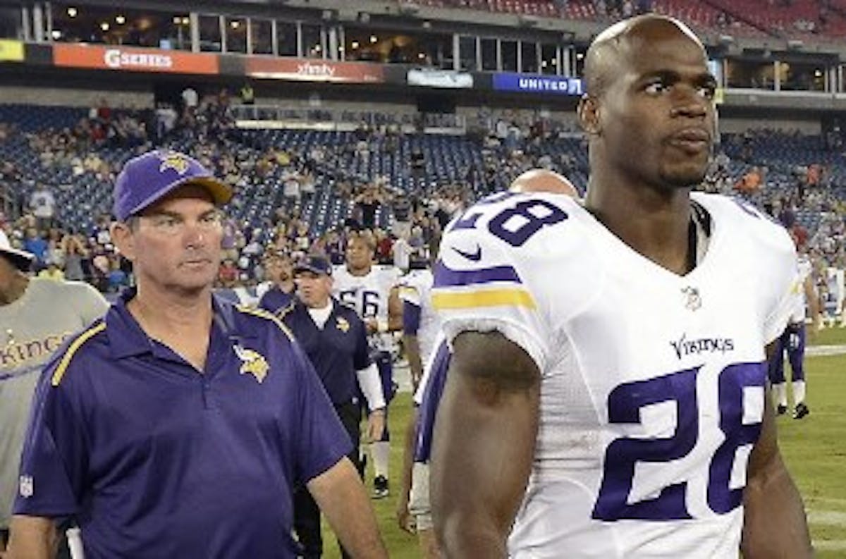 Vikings coach Mike Zimmer and running back Adrian Peterson.