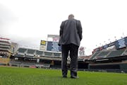 Star Tribune sports columnist Sid Hartman stood on the grass at Target Field in Minneapolis, Minn.