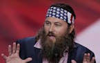 Willie Robertson, CEO of Duck Commander and Buck Commander speaks during the opening day of the Republican National Convention in Cleveland, Monday, J