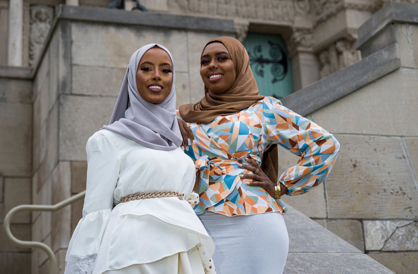 Yasmin Samatar( all white) and Firaoli Adam are the inventors of the Hijab on the Go, a disposable hijab on the campus of St. Catherine University where they met studying to be respiratory therapists in St. Paul, Minn., on Tuesday, June 7, 2022. Two women learn and solve one of the difficulties of being a Muslim woman in the healthcare field. ] RICHARD TSONG-TAATARII • richard.tsong-taatarii@startribune.com ORG XMIT: MIN2206081339112008