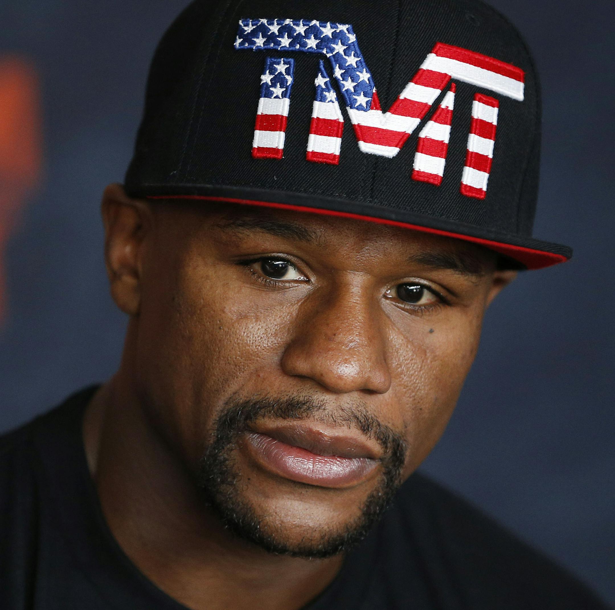 Boxer Floyd Mayweather Jr. speaks with the media before a workout Tuesday, April 14, 2015, in Las Vegas. Mayweather will face Manny Pacquiao in a welterweight boxing match in Las Vegas on May 2. (AP Photo/John Locher) ORG XMIT: otk123