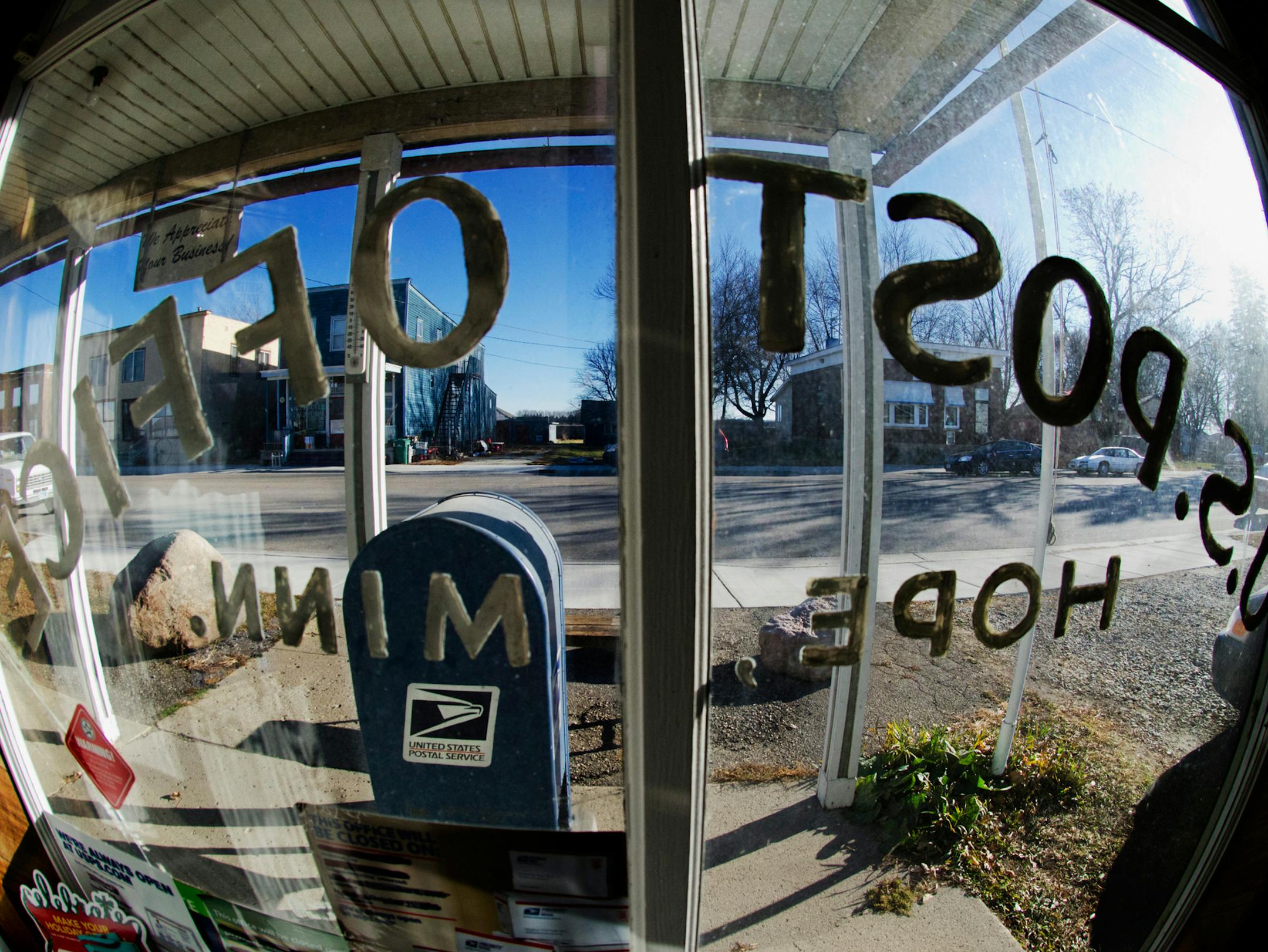 The U.S. Postal Service is seeking to balance it's budget by closing 3,700 small town post offices across the country. The post office in Hope is one of the 100 or so in Minnesota that are being considered for closing. Steele County Highway 4 passes outside the front window of the Hope Minnesota Post Office. ] (DAVID BREWSTER/STAR TRIBUNE ï dbrewster@startribune.com) ** ORG XMIT: MIN2014030416473380