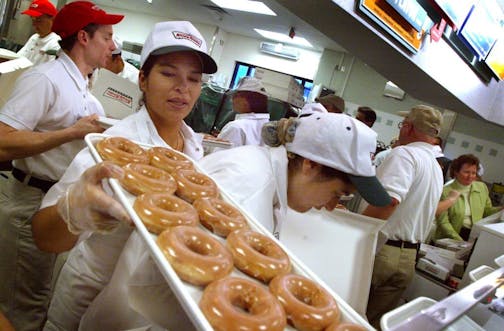 Maple Grove, MN. 4/23/02--Krispy Kreme made it's arrival this morning in Maple Grove. There were nearly 500 waiting in line when the doors opened at 5:30AM. A few had been there all night long. Krispy Kreme expects to sell at least a million doughnuts today. There are 40 people per shift that are working until things settle down at the store.