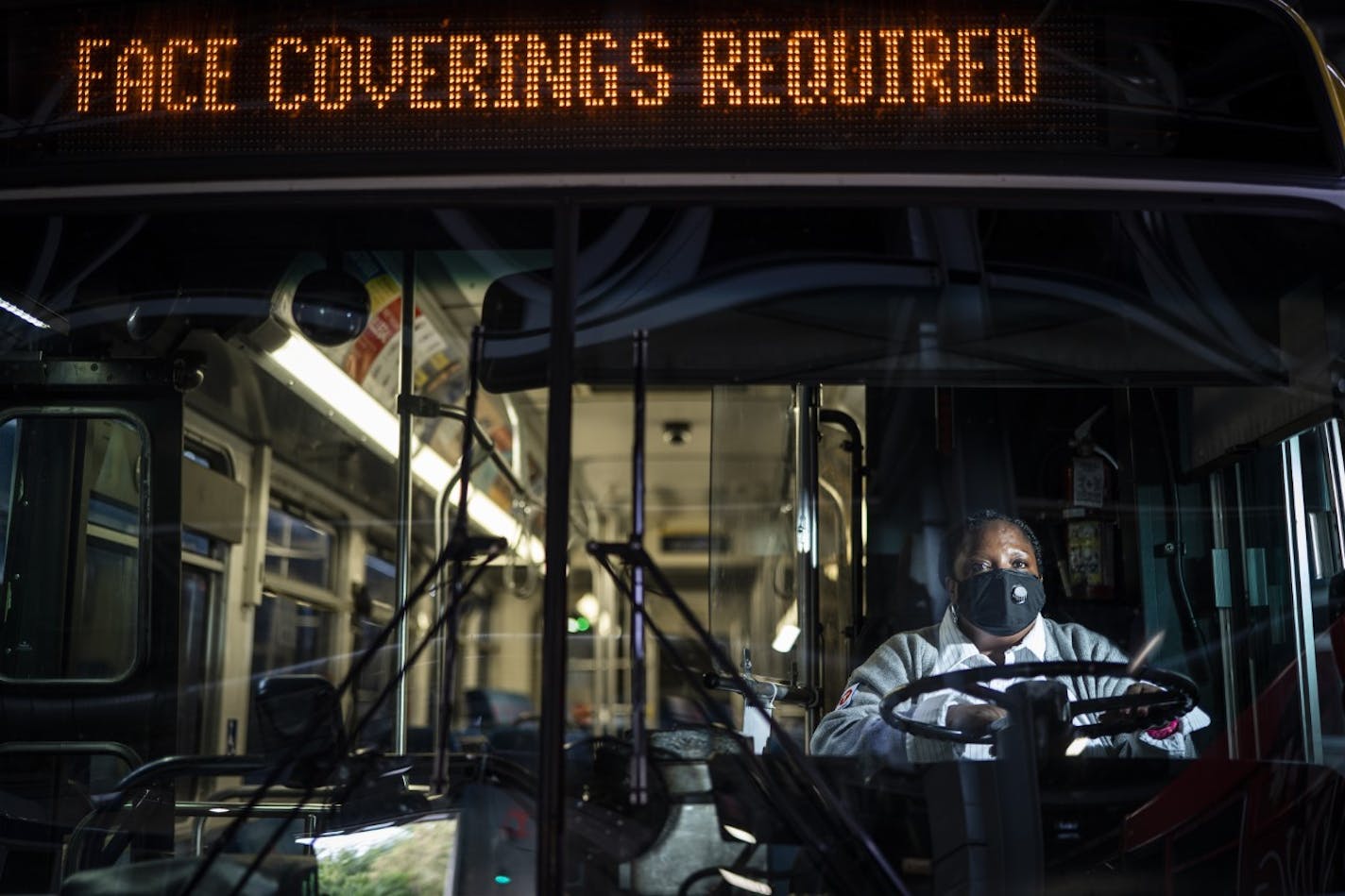 File photo by Leila Navidi Metro Transit driver Lauren Cox drives a route in the east metro. The union on Wednesday authorized a possible strike.