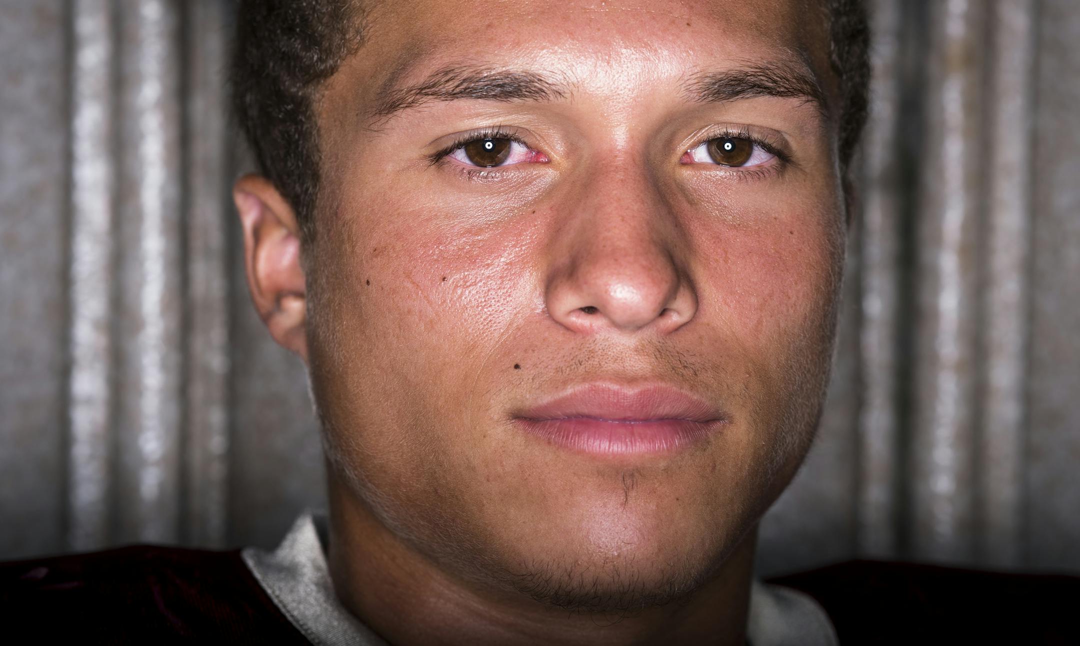 Maple Grove's Isaac Collins was photographed outside the State Theatre Tuesday night. ] Aaron Lavinsky • aaron.lavinsky@startribune.com Prep football special section photoshoot on Tuesday, August 11, 2015 at the State Theatre in Minneapolis.