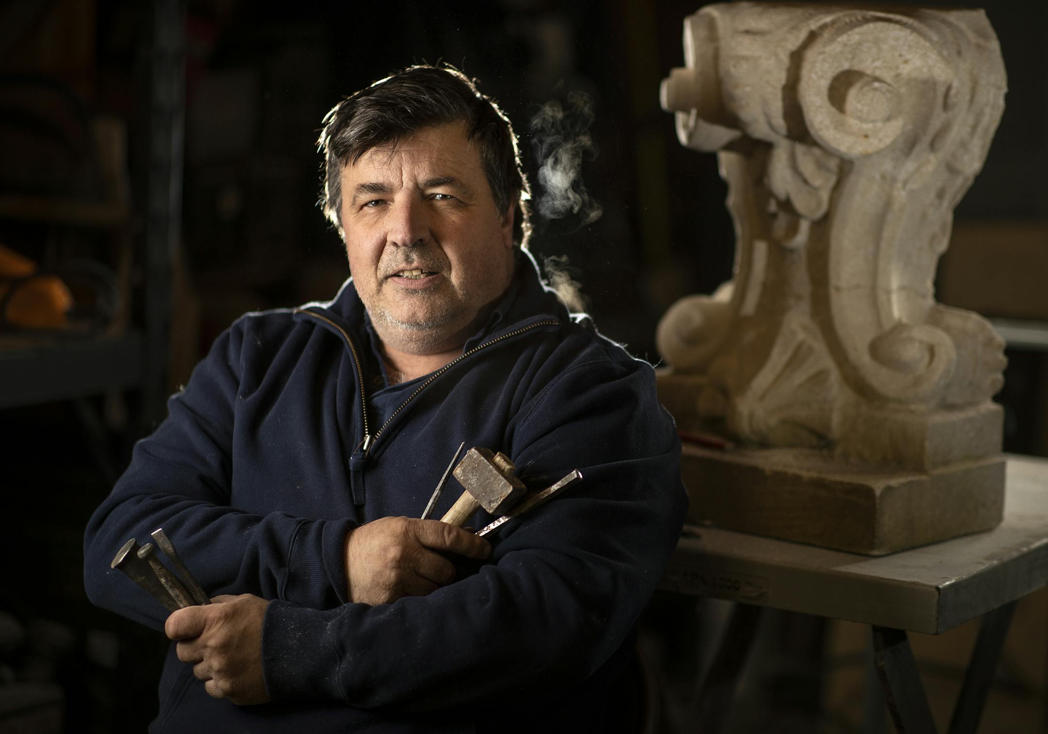 Portrait of stone carver Jean Pierre Jacquet at his home in Burnsville .] Jerry Holt • Jerry.Holt@startribune.com Portrait of stone carver Jean Pierre Jacquet Monday, January 13, 2020 at his home in Burnsville ,MN.