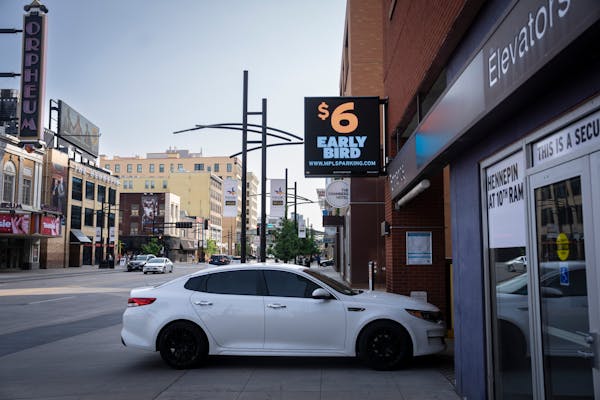 A car entered the municipal parking ramp at Hennepin Avenue and 10th Street, where rates went up this month.