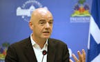 FILE - In this Saturday, April 29, 2017 file photo, FIFA President Gianni Infantino gives a press conference at the National Palace in Port-au-Prince,