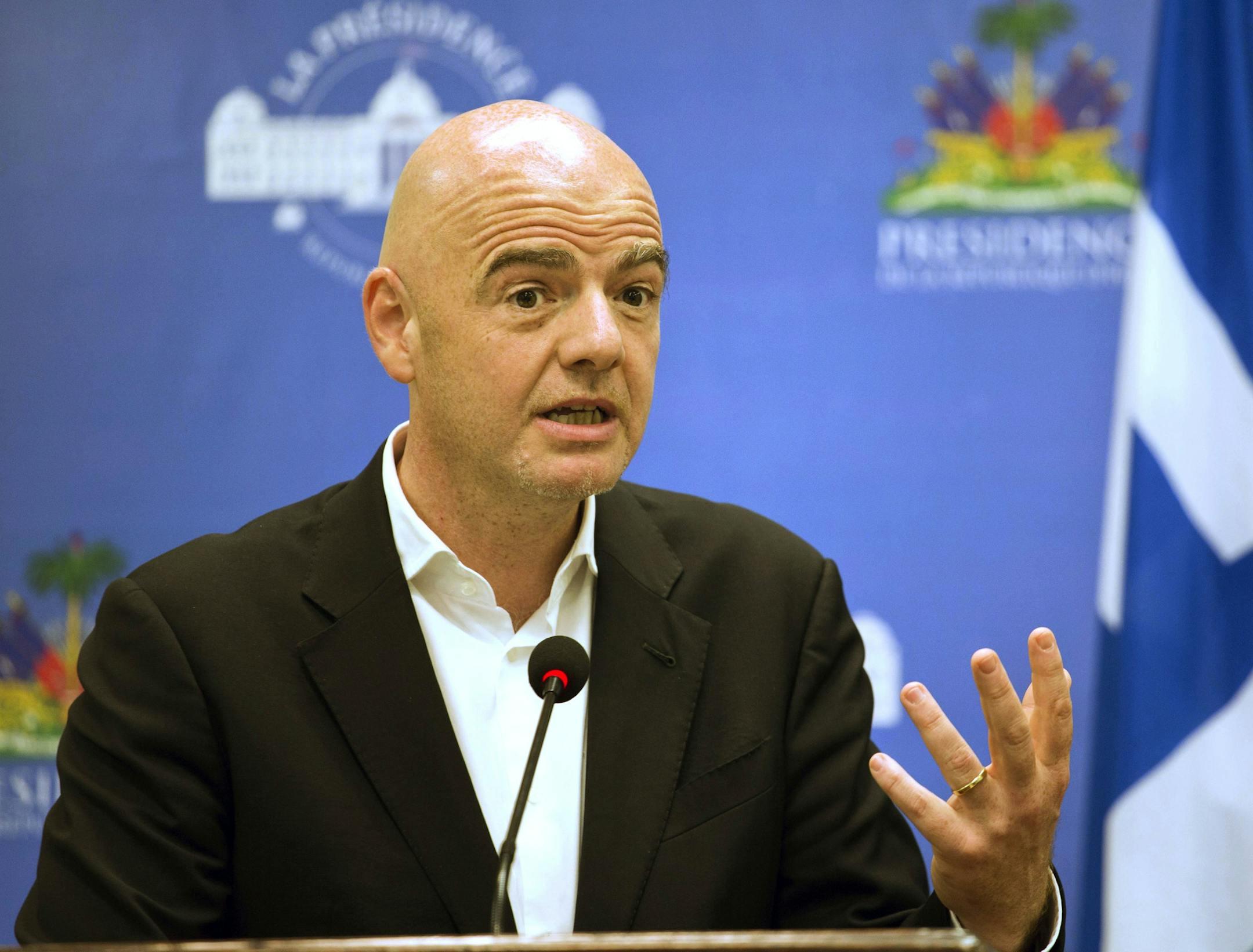 FILE - In this Saturday, April 29, 2017 file photo, FIFA President Gianni Infantino gives a press conference at the National Palace in Port-au-Prince, Haiti. An accelerated process to hand North America the 2026 World Cup is set to be approved by soccer leaders this week, with FIFA President Gianni Infantino hoping for a "bulletproof" process to avoid past voting scandals. The United States, Canada, and Mexico are seeking an unchallenged path to co-hosting rights for the 2026 showpiece, if FIFA'