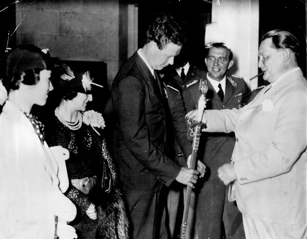 Lindbergh accepts a medal in 1938 from Hermann Goering, a Nazi leader. Lindbergh never returned the medal.