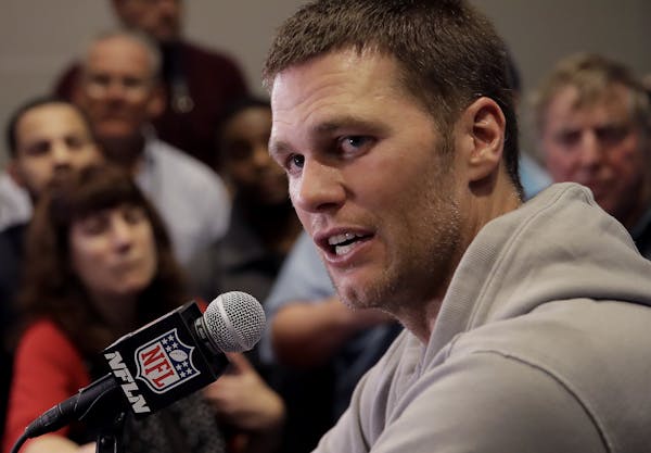 New England Patriots quarterback Tom Brady does an interview during a media availability for the NFL Super Bowl 51 football game Wednesday, Feb. 1, 20