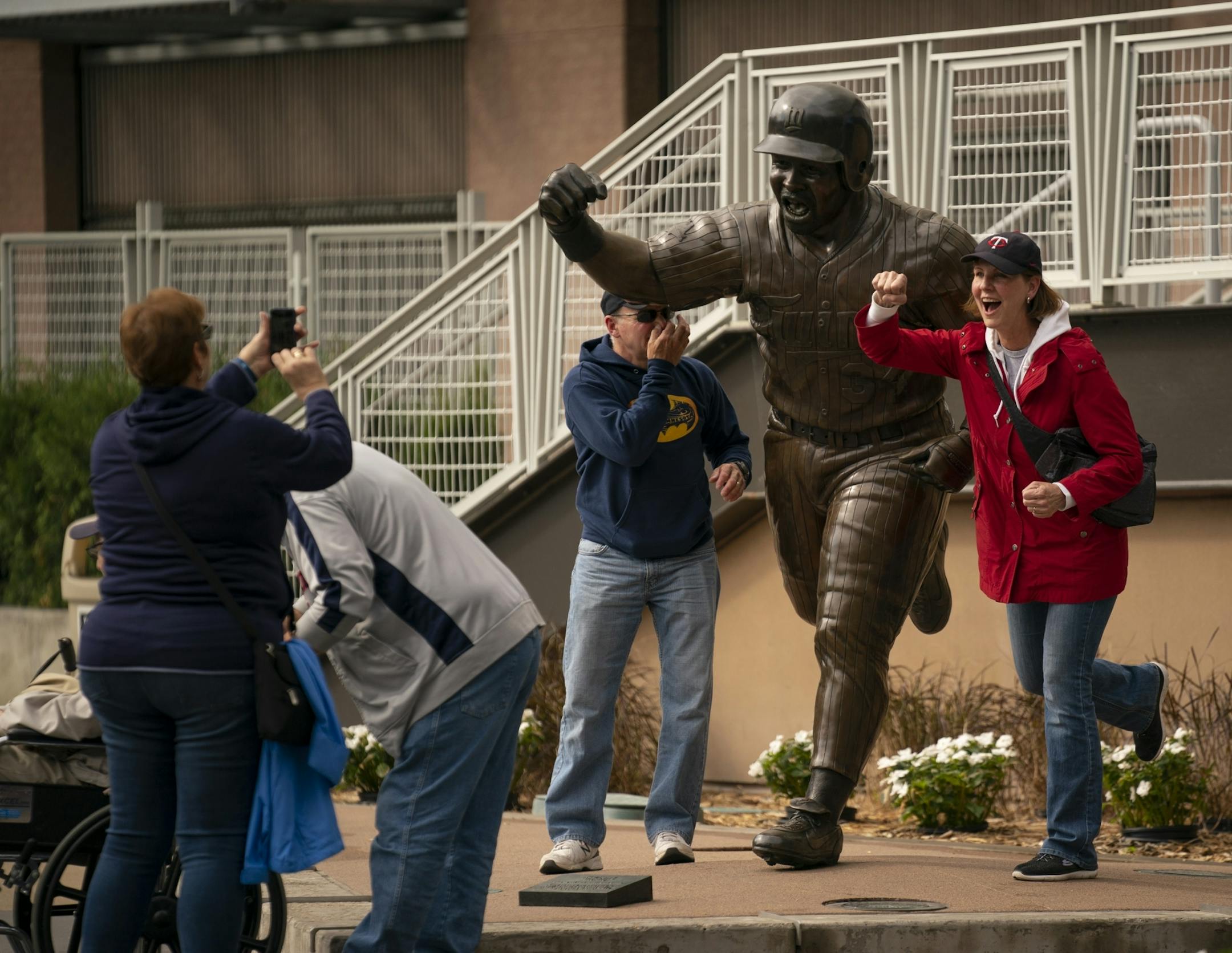 The Twins' standing as one of the best teams in baseball has drawn both hard-core and casual fans, such as Jerry and Val Battis, who posed with Kirby Puckett's statue Tuesday at Target Field.