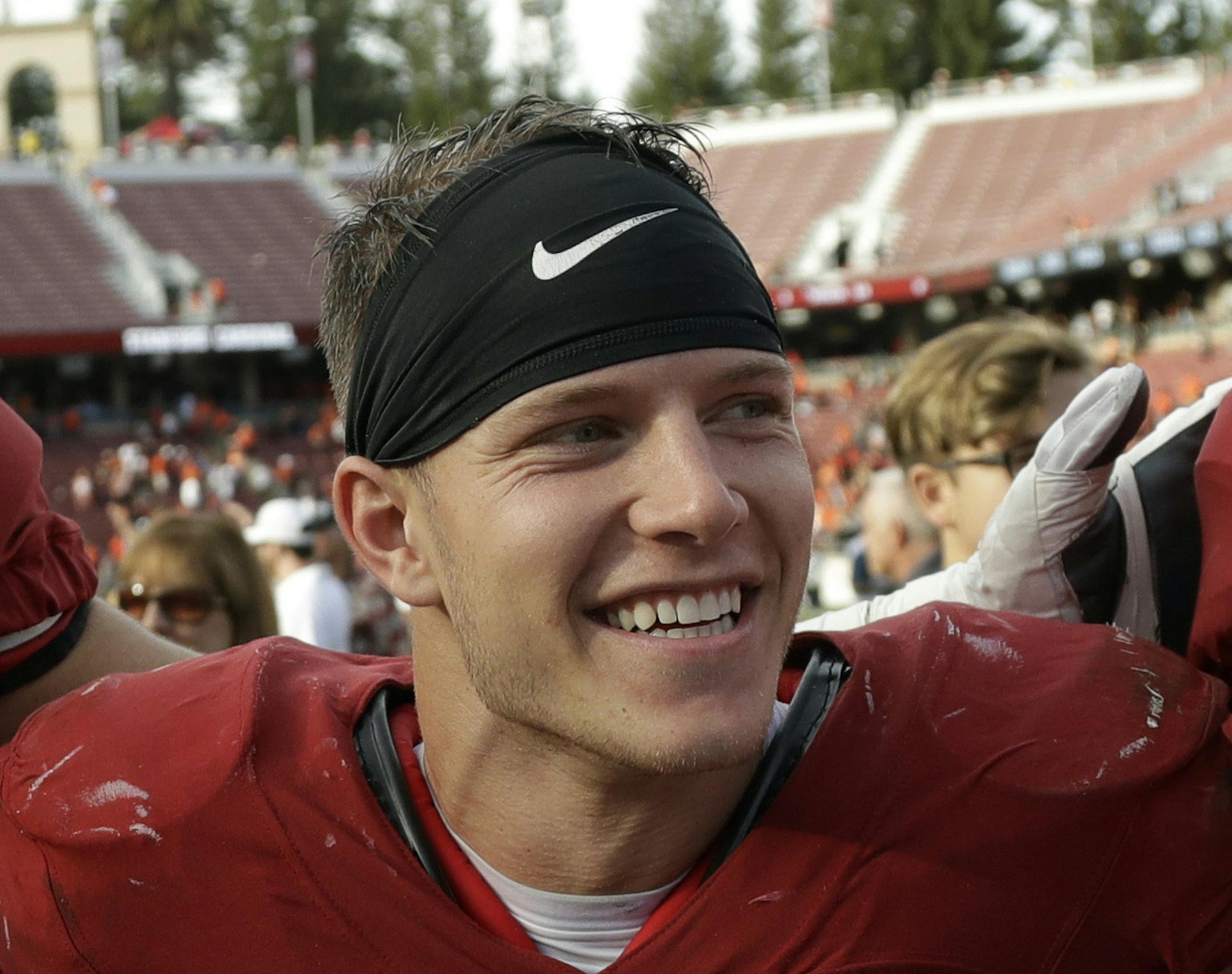 FILE - In this Nov. 5, 2016, file photo, Stanford running back Christian McCaffrey (5) smiles after Stanford defeated Oregon State, 26-15, in an NCAA college football game, in Stanford, Calif. McCaffrey is done playing college football. Stanford’s star running back announced on Twitter on Monday, Dec. 19, 2016, that he will not play in the 16th-ranked Cardinal’s Sun Bowl game against North Carolina (8-4) on Dec. 30 in El Paso, Texas. “Very tough decision, but I have decided