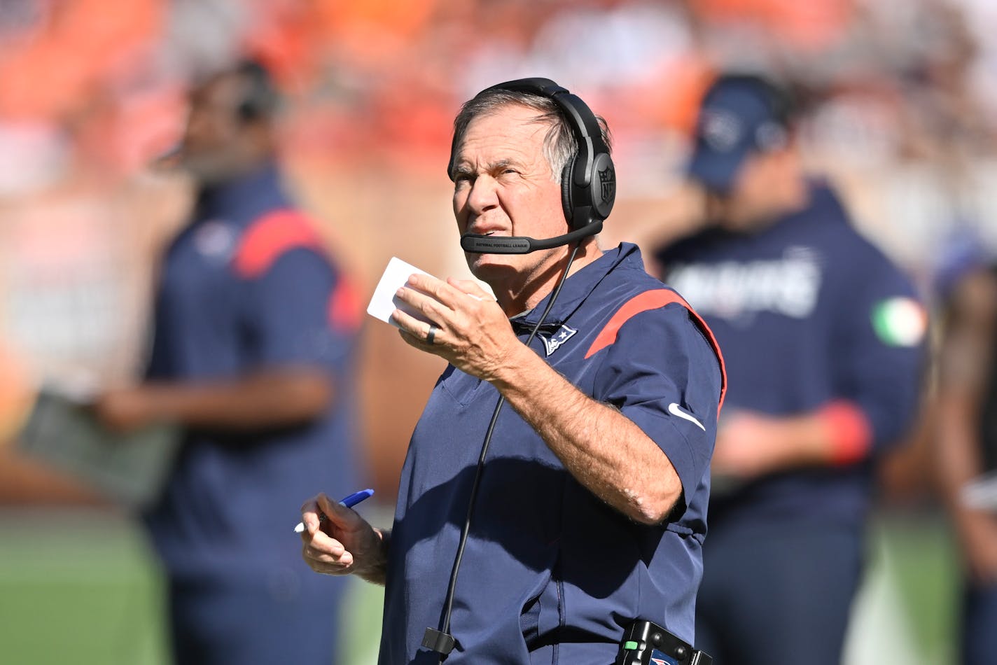 New England Patriots head coach Bill Belichick watches as his team plays against the Cleveland Browns during the second half of an NFL football game, Sunday, Oct. 16, 2022, in Cleveland. (AP Photo/David Richard)