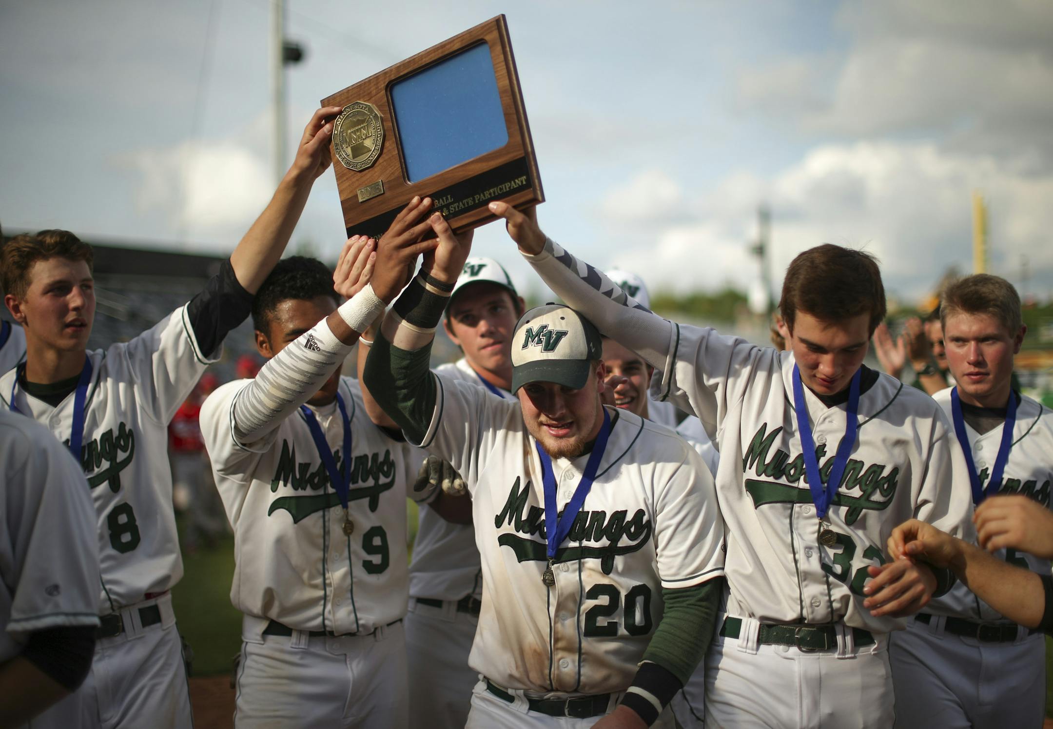 Mounds View players carried Class 3A, Section 5 championship trophy after earning a berth in the state tournament last week at CHS Field in St. Paul. (Jeff Wheeler, Star Tribune)