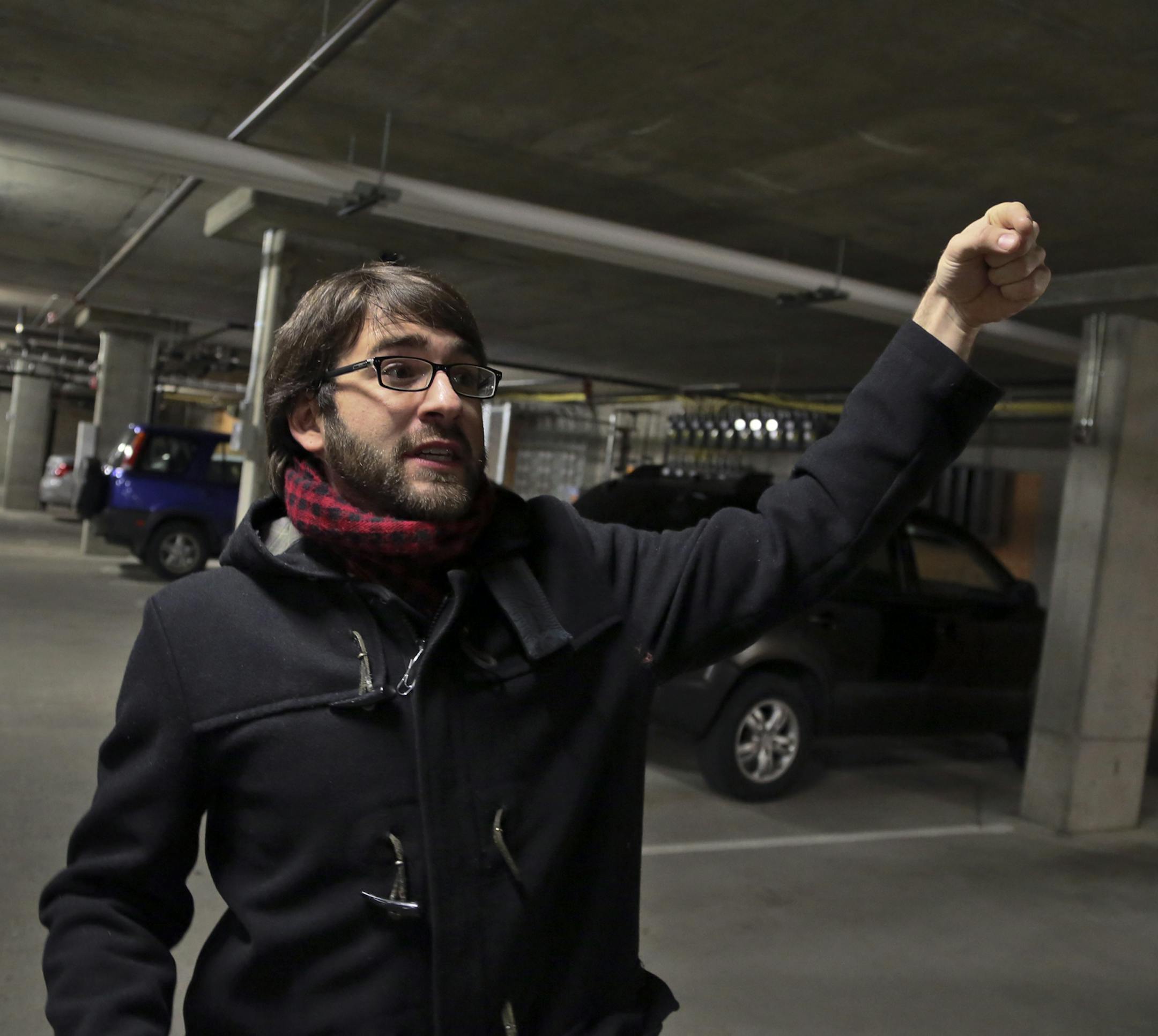 Brett Rogers, who recently moved to Minneapolis from New York City and lives in the Station 38 Apartments, was among the residents there who had their vehicles broken into inside the apartment's underground parking garage. Rogers, who said the building is completely secure and that the perpetrators would have had to come in through the overhead garage door seen at the rear left, said he didn't keep any valuable inside his vehicle and that a window was broken but nothing taken during the Nov. 12
