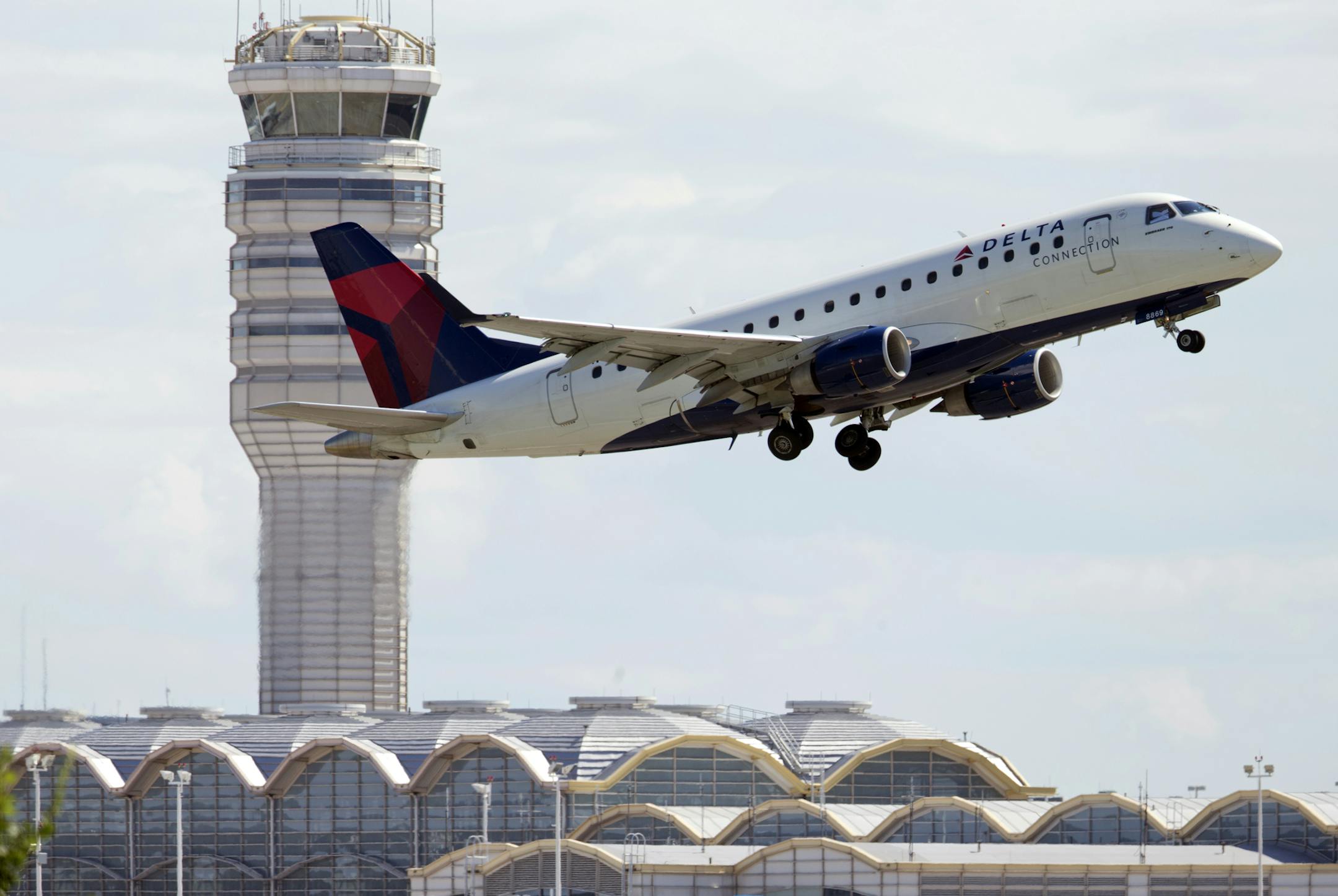 FILE - In this July 28, 2014 file photo, a Delta Air Lines jet takes off from Ronald Reagan Washington National Airport in Arlington, Va. Most restrictions on flights between the U.S. and Mexico will lift on Sunday, Aug. 21, 2016, a change expected to bring more options and possibly lower prices for travelers. American, Delta and Southwest have already announced that they will offer new flights across the border later this year. United is watching the demand for flights and will respond accordin