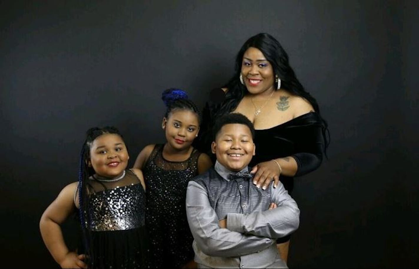 Essie McKenzie with her childrenTy'Rah, Taraji and Terrell White. The girls were severely burned when the van they were in caught fire in a Wal-Mart parking lot. Ty'Rah died from her injuries, while Taraji remains in critical condition at HCMC.