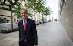 Norm Coleman outside his Washington, D.C. office in 2015. Coleman announced Tuesday that he will undergo surgery later this month to remove part of hi