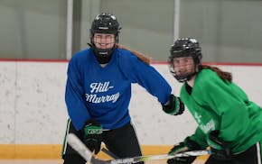 Emily Pohl, eldest daughter of Hill-Murray co-head coaches Johnny and Krissy, kept a smile at practice earlier this season.