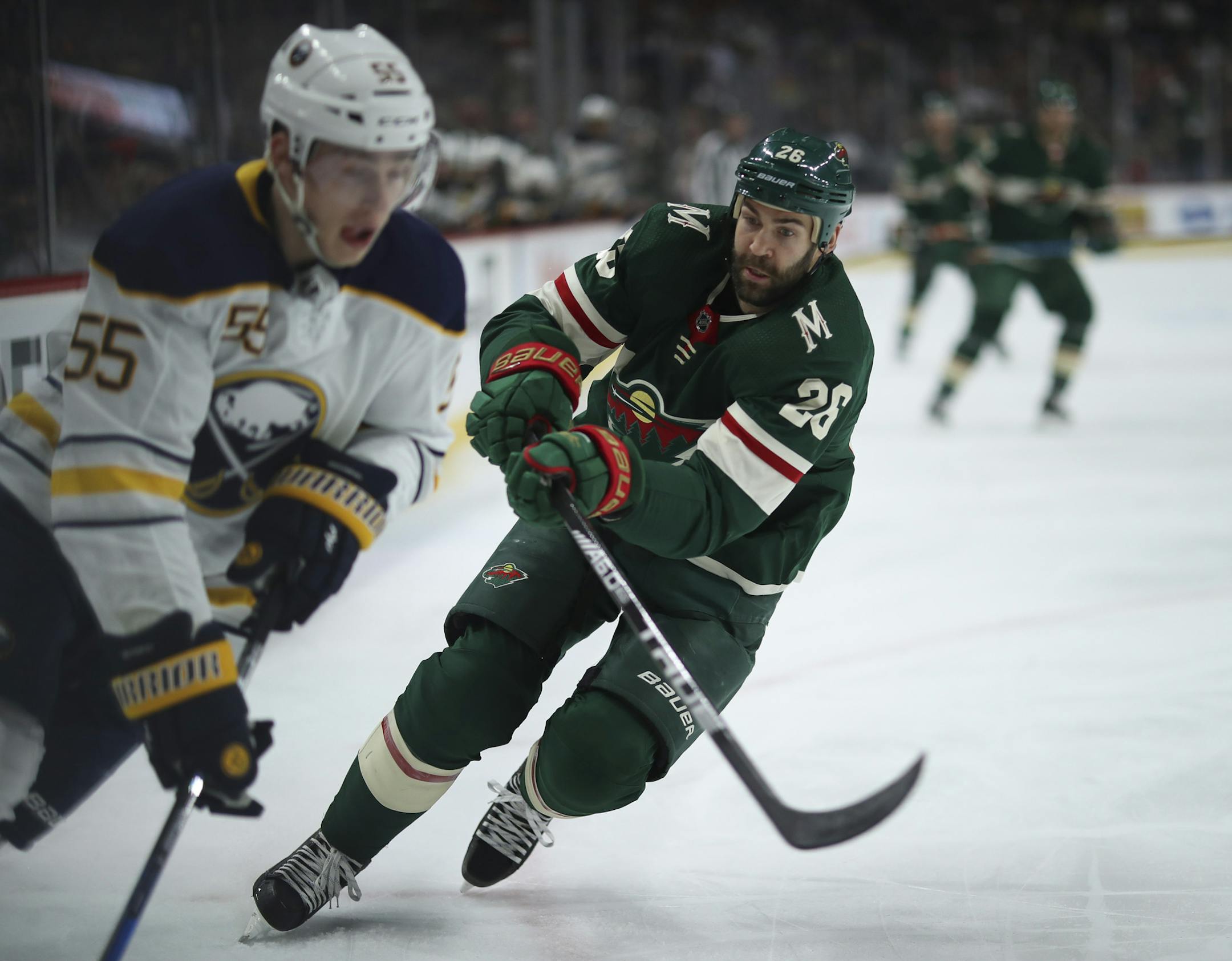 Minnesota Wild left wing Daniel Winnik (26) trailed Buffalo Sabres defenseman Rasmus Ristolainen (55) in the first period. ] JEFF WHEELER ï jeff.wheeler@startribune.com The Minnesota Wild faced the Buffalo Sabres in an NHL hockey game Thursday night, January 4, 2018 at Xcel Energy Center in St. Paul.