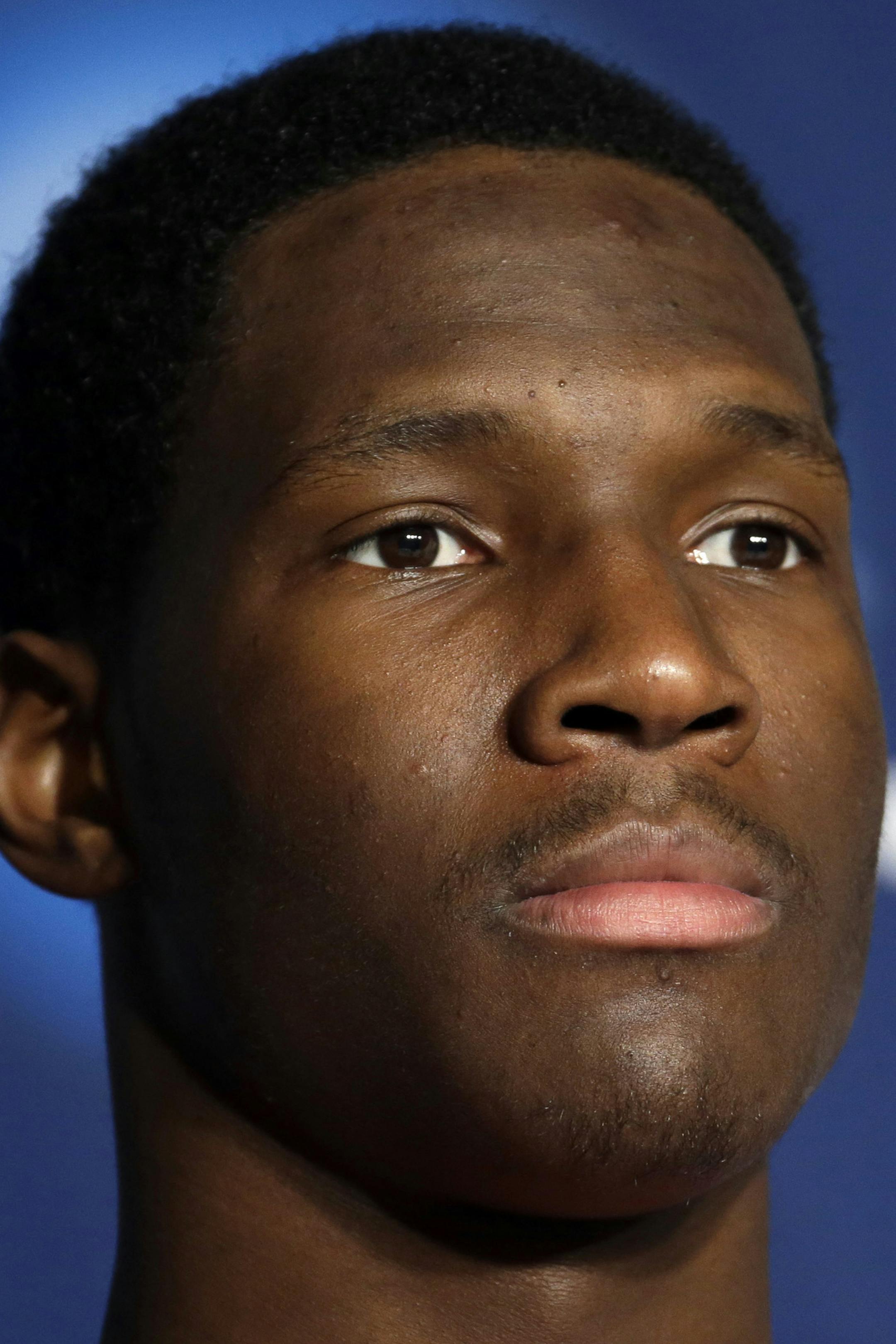 Wisconsin forward Nigel Hayes listens to questions from reporters during a news conference for the third-round game of the NCAA college basketball tournament Friday, March 21, 2014, in Milwaukee. Wisconsin plays Oregon on Saturday. (AP Photo/Morry Gash) ORG XMIT: WIKS105