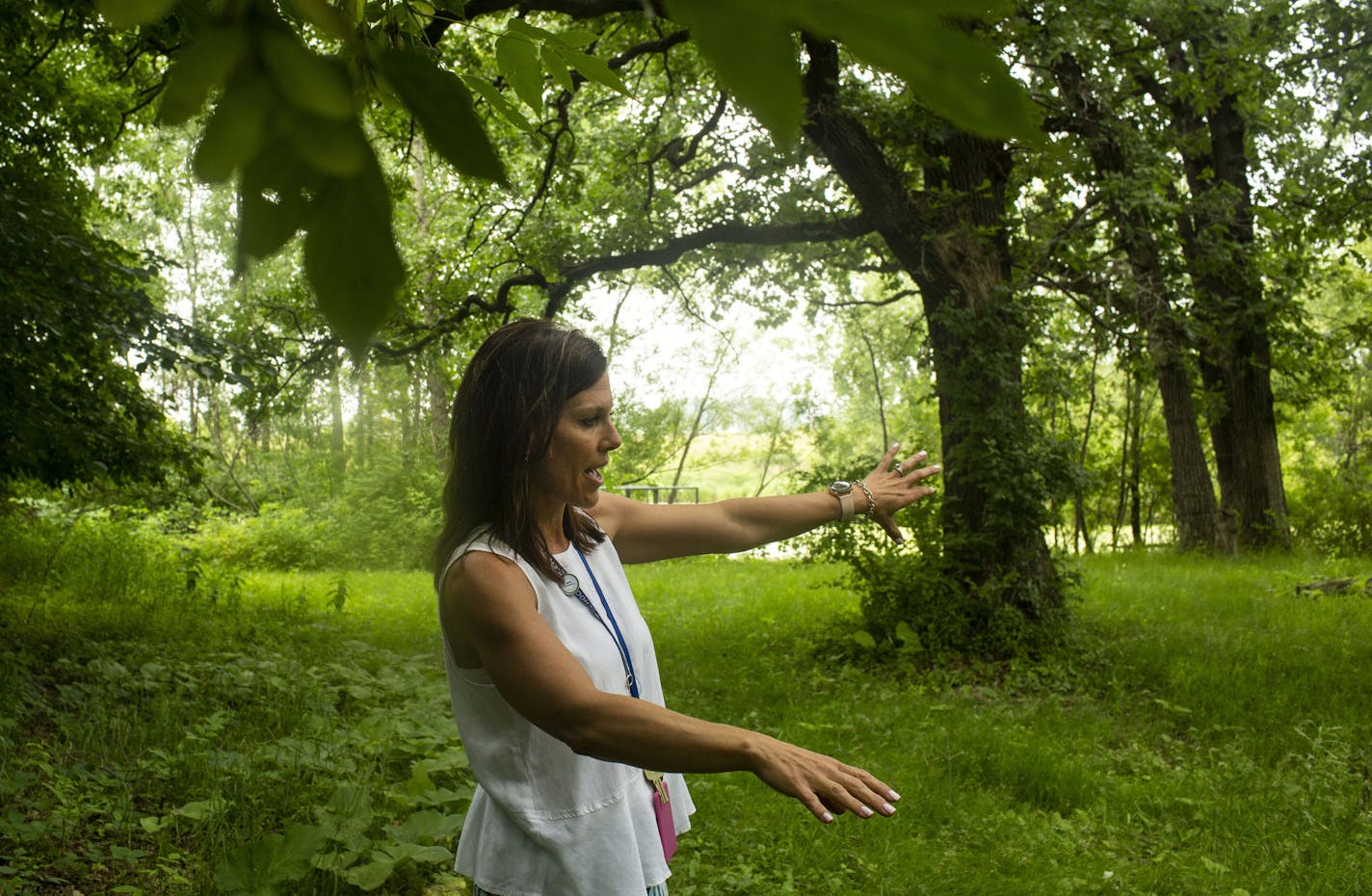 Principal Jocelyn Sims shows what will be an outdoor classroom for the School Forest Program. ] NICOLE NERI &#x2022; nicole.neri@startribune.com BACKGROUND INFORMATION: Principal Jocelyn Sims shows a new E-STEM middle school Tuesday, July 9, 2019. The school will open in the fall with only sixth graders for its first year.