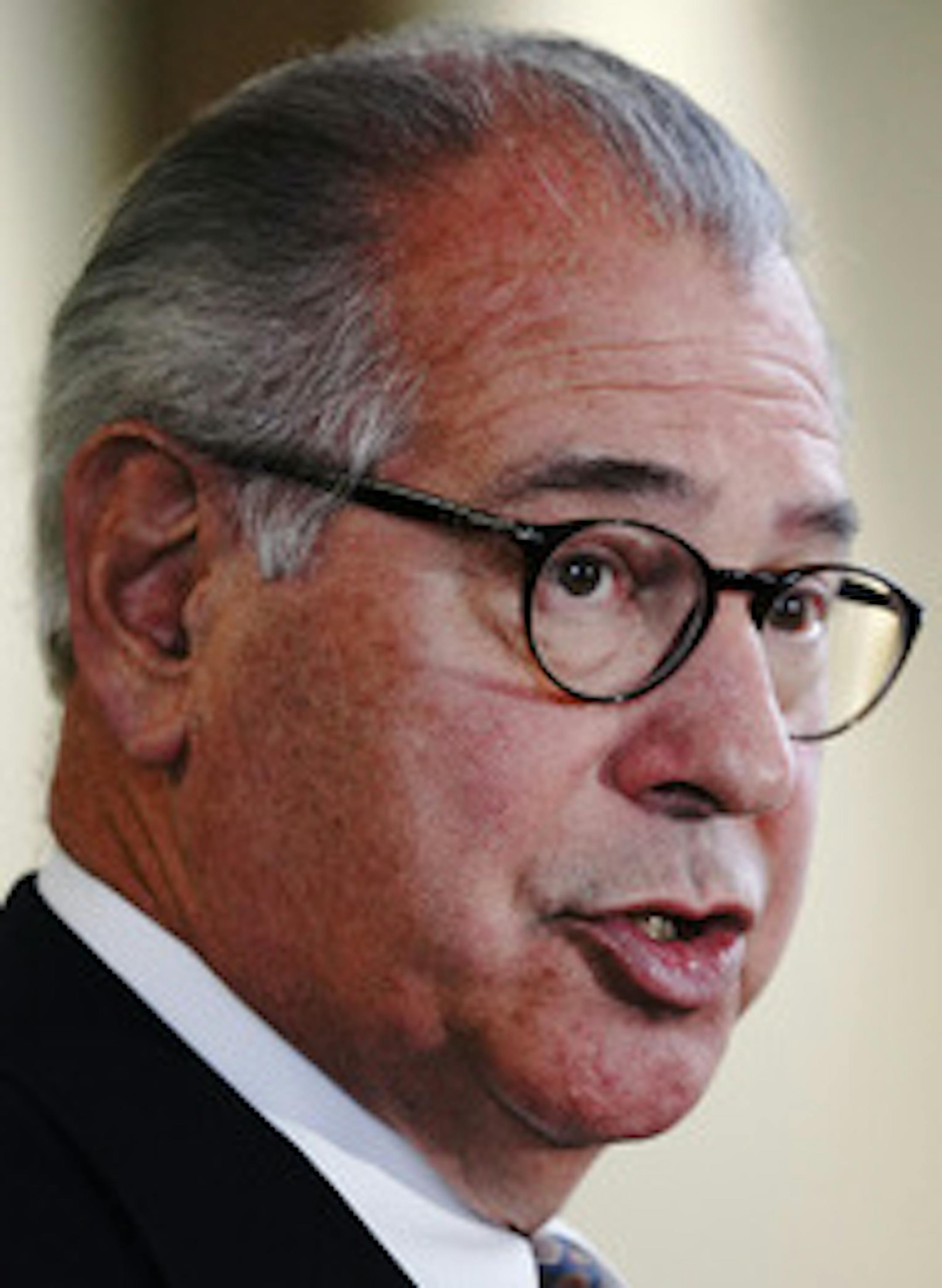 Freeman said surveillance video showed Johnson repeatedly aggress the teens, though it doesn't appear he pointed his loaded weapon directly at them. ] MARK VANCLEAVE ¥ mark.vancleave@startribune.com * Hennepin County Attorney Mike Freeman announced charges against a man who brandished a handgun and threatened a group of Somali teens at a McDonald's in Eden Prairie in November. Lloyd Johnson, 55, was charged Monday with felony terrorist threats and not having a permit to carry his weapon. Ph