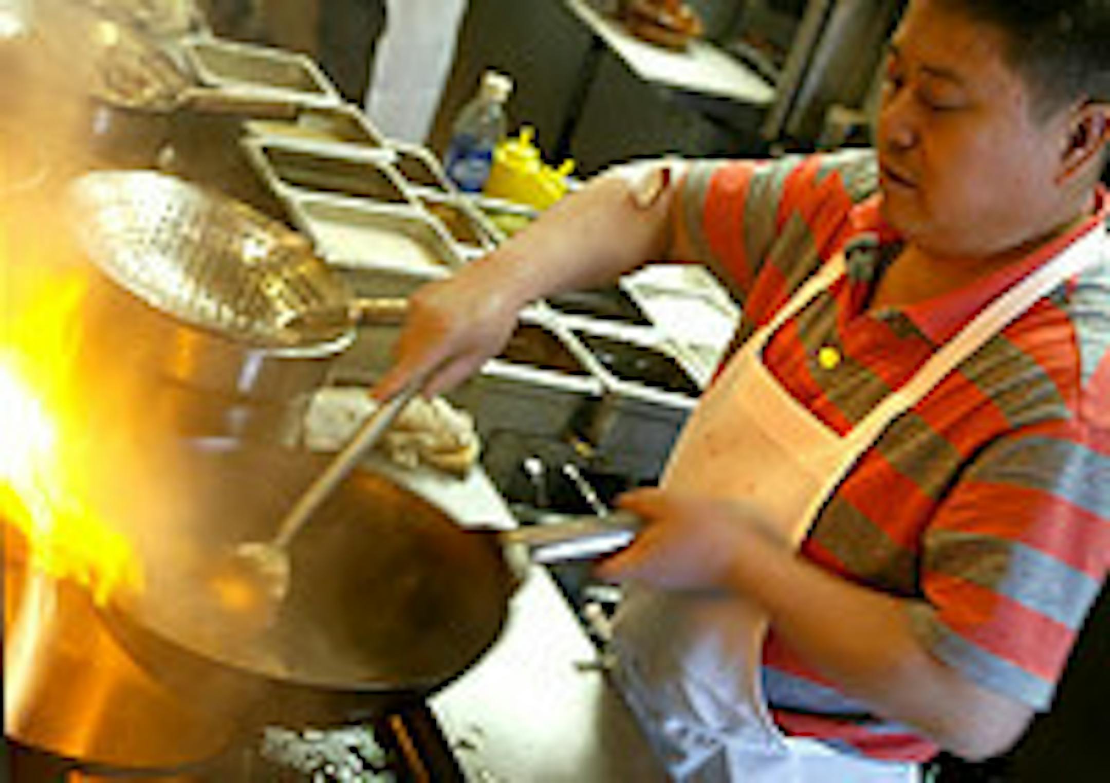 Chef Guanghe Luo turns up the heat on dishes at Little Szechuan