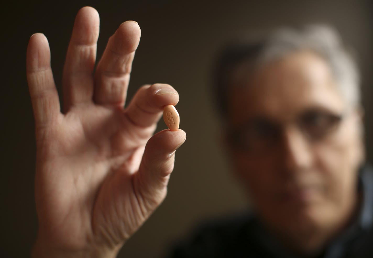 Steve Busa held a tablet of Harvoni, the $1000 a pill drug he is taking to cure him of a liver ailment. ] JEFF WHEELER &#xef; jeff.wheeler@startribune.com Steve Busa is living a medical breakthrough. In late March, he'll finish taking 90 days worth of a new medication that likely will cure him of a liver ailment that otherwise might lead to cancer, a liver transplant and even his death. So, he thinks the drug is well worth a retail price of $1,000 per pill. Busa was photographed Wednesday aftern