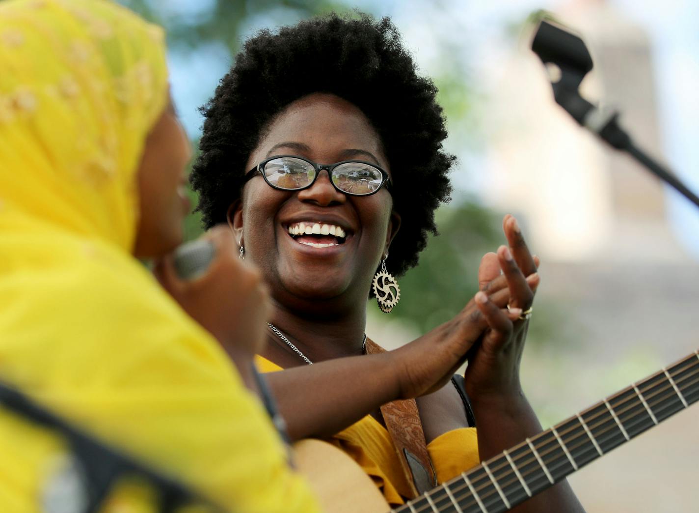 Filsan Ibrahim of St. Paul, left, the MC introduces musical artist Kashimana Ahua, who is from Nigeria but now lives in St. Paul, before Ahua performed at Little Africa Festival in St. Paul! at Hamline Park Saturday, Aug. 13, 2016, in St. Paul, MN.](DAVID JOLES/STARTRIBUNE)djoles@startribune Join African Economic Development Solutions, Little Africa artists & business owners, and the African community for our 2016 Annual Little Africa Festival in St. Paul! This year's theme is: "Celebrating Arti