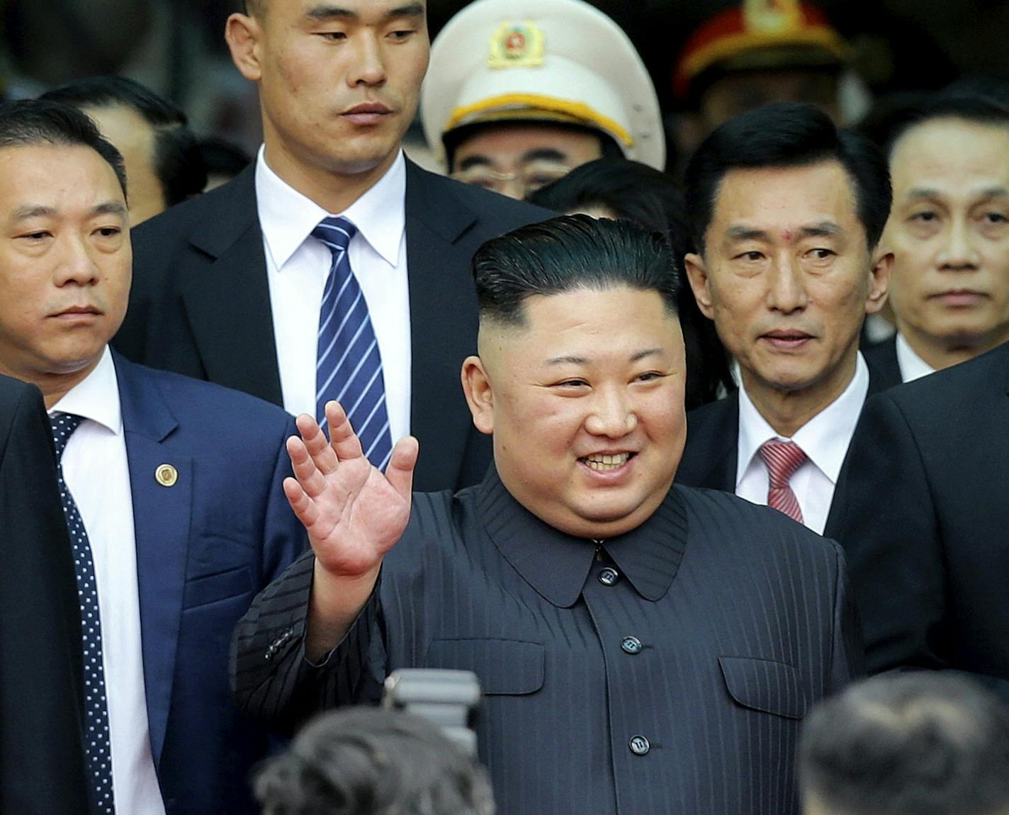 North Korean leader Kim Jong Un waves upon arrival by train in Dong Dang in Vietnamese border town Tuesday, Feb. 26, 2019, ahead of his second summit with U.S. President Donald Trump.