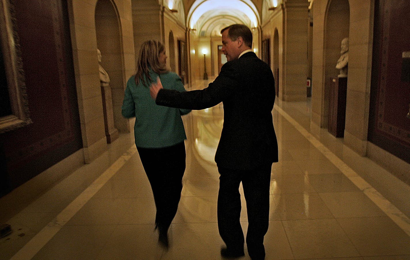 JIM GEHRZ &#x2022; jgehrz@startribune.com
Minneapolis, MN/November 8, 2006/10:15AM
DFL Attorney General Mike Hatch walks down an empty corridor toward his office at the State Capital with his running mate, Judy Dutcher, after the gubernatorial candidate conceded the election at a news conference at the capitol.