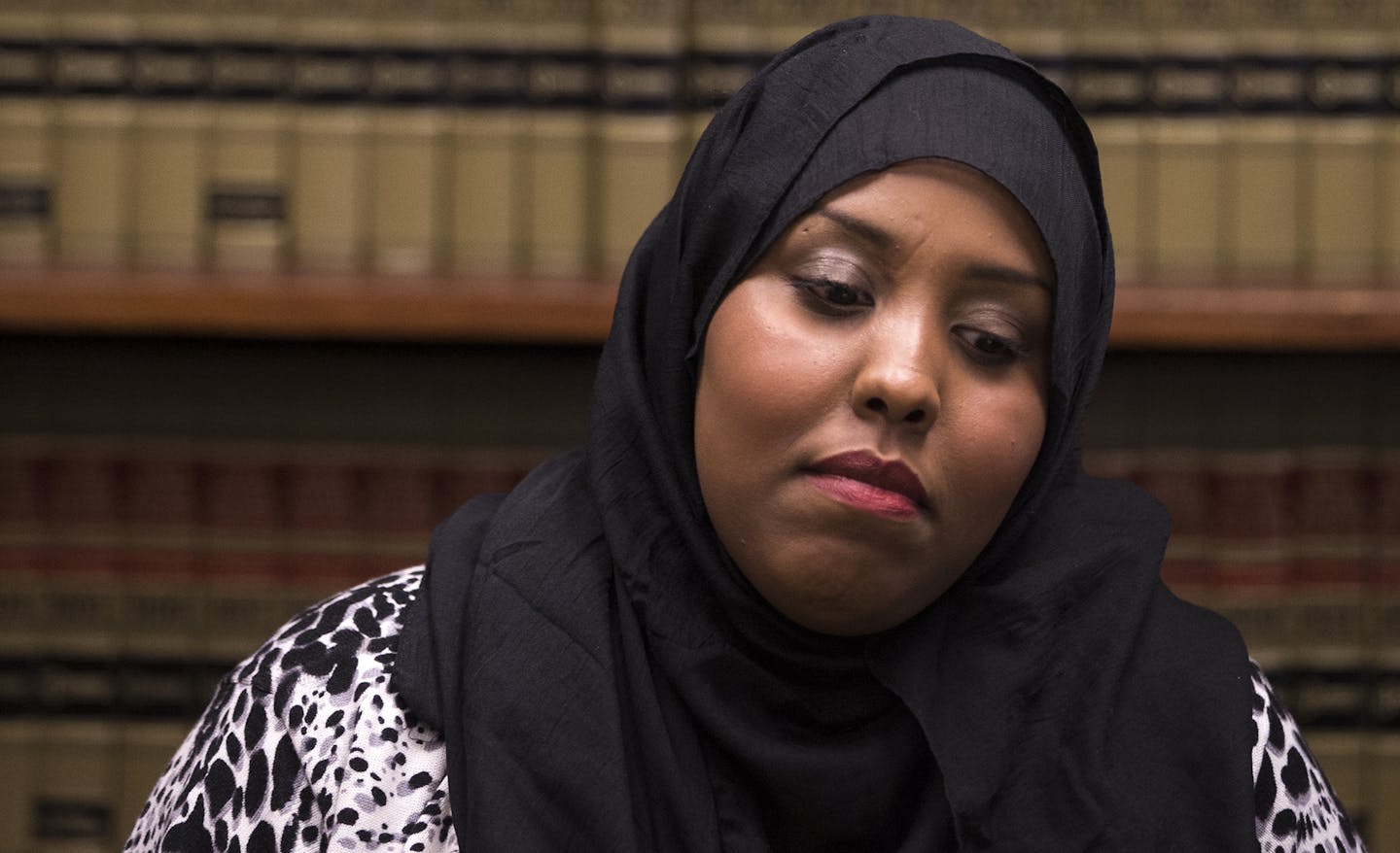 Hamdi Ali Osman sits during a press conference at Applebaum Law Firm in St. Paul. ] (Leila Navidi/Star Tribune) leila.navidi@startribune.com BACKGROUND INFORMATION: Thursday, April 7, 2016 at Applebaum Law Firm in St. Paul. Hamdi Ali Osman, 26, was named and charged in the now known as fabricated story of sex trafficking by St. Paul Police Sgt. Heather Weyker in 2010. Osman has spent six years on and off in federal detention in Kentucky awaiting trial and was released less than a month ago after